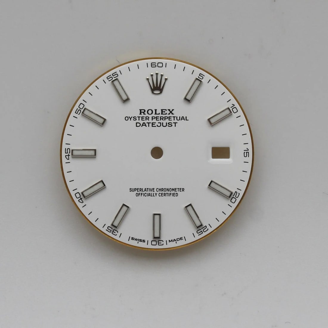 White Stick Marker Dial for Rolex Datejust 126334 or 126300: White Stick Marker Dial for Rolex Datejust 126334 or 126300 This is a pre-owned Rolex Datejust watch dial featuring stick markers and a white finish. The dial is in good condition and is very clean wi