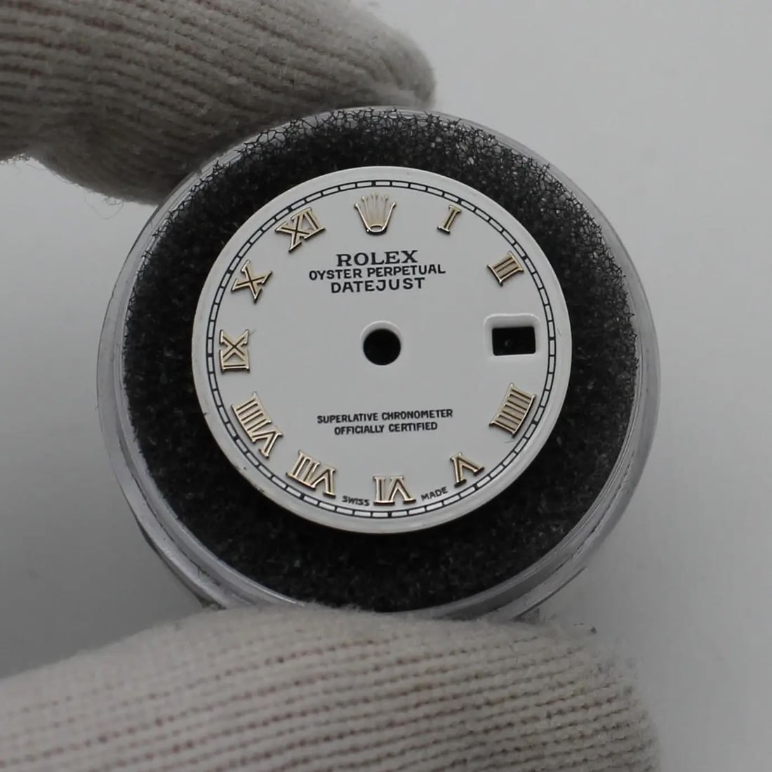 Rolex White Roman Numeral Dial for Oyster Perpetual Datejust 179174 79174: Rolex White Roman Numeral Dial for Oyster Perpetual Datejust 179174 79174 This is a pre-owned Rolex dial designed for the Oyster Perpetual Datejust models 179174 and 79174. The dial features Roman num