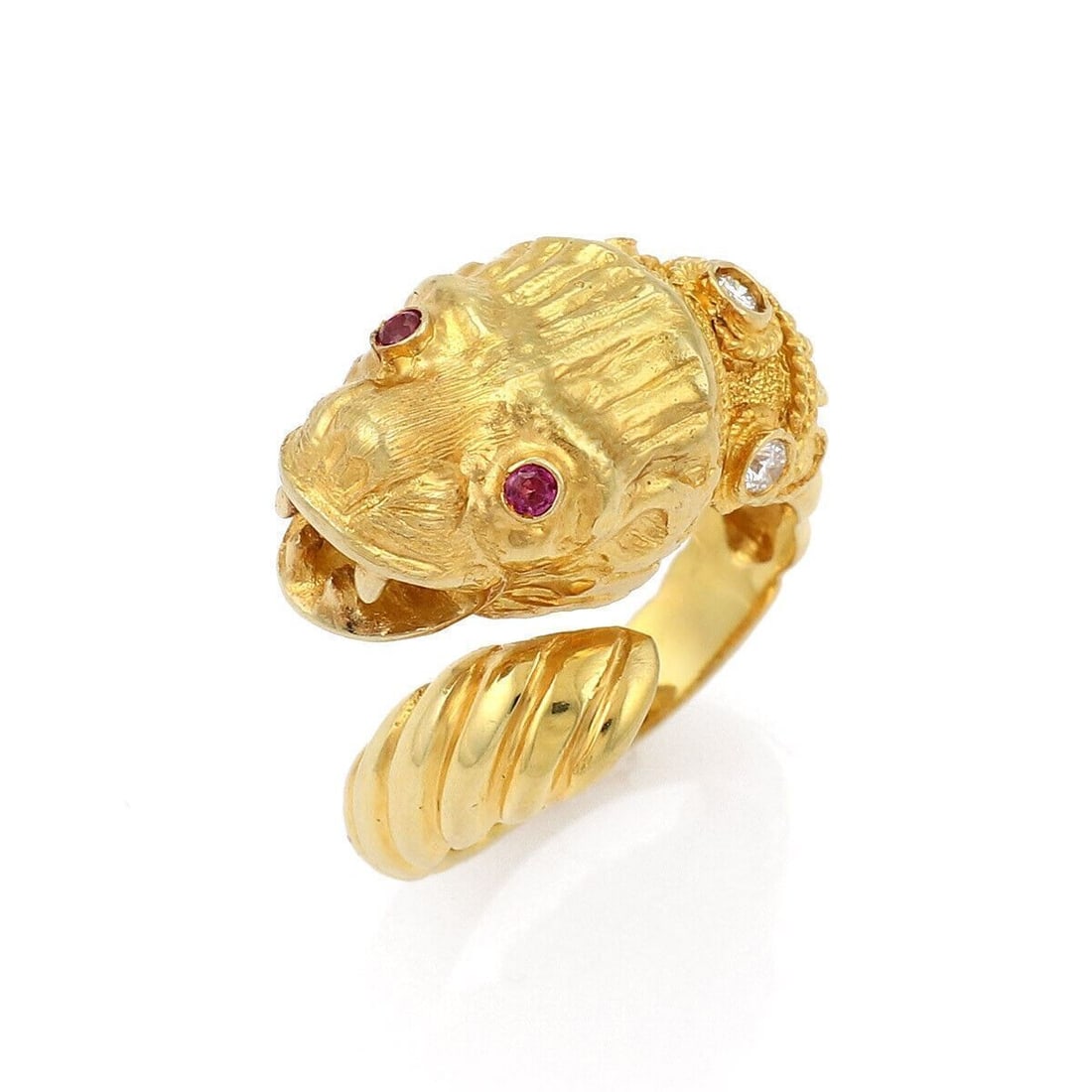 Ilias Lalaounis 18k Gold Lion Head Bypass Ring with Ruby and Diamond Size 6.75: Ilias Lalaounis 18k Gold Lion Head Bypass Ring with Ruby and Diamond Size 6.75 A sculptural bypass ring in 18k yellow gold featuring a lion head design accented with natural diamonds and natural rubie