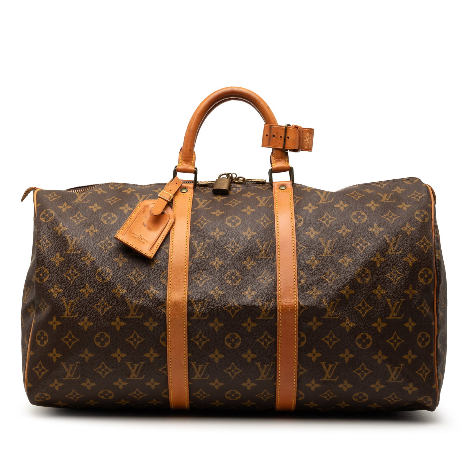 Louis Vuitton Keepall 50 Monogram Canvas Travel Bag: Louis Vuitton Keepall 50 Monogram Canvas Travel Bag The Louis Vuitton Monogram Keepall 50 is a classic travel bag crafted from the brand's signature monogram canvas with rolled leather handles and a t