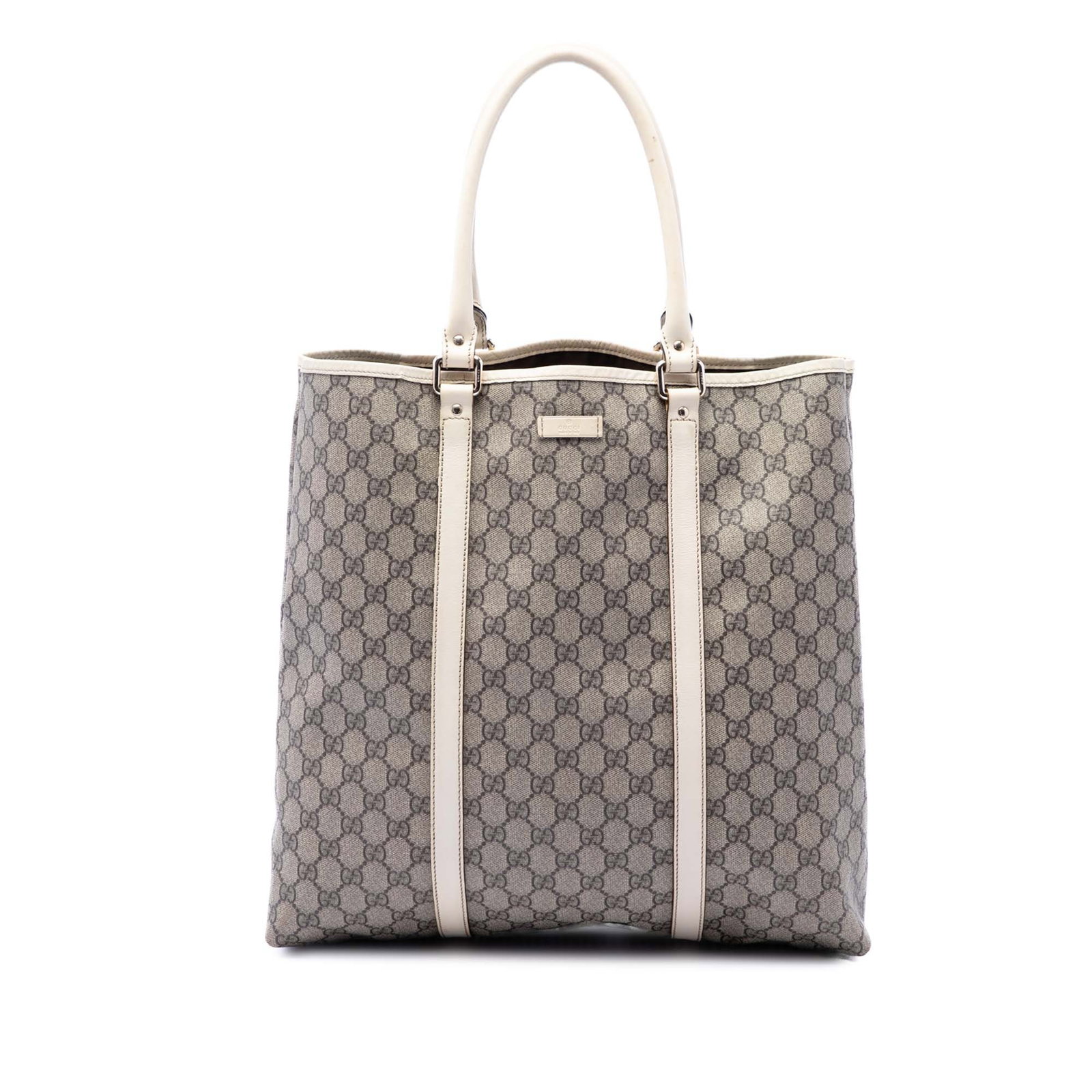Gucci GG Supreme Joy Vertical Tote Coated Canvas Bag: Gucci GG Supreme Joy Vertical Tote Coated Canvas Bag Gucci GG Supreme Joy Vertical Tote in beige with a coated canvas body and leather trim. This tote features rolled leather handles, an open top with