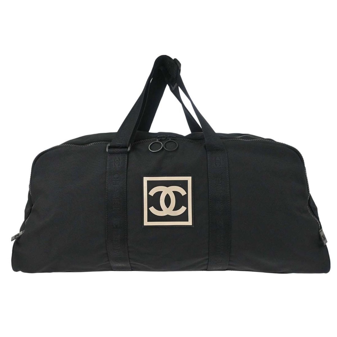 CHANEL Sport Line Black Nylon Extra Large Duffle Bag: CHANEL Sport Line Black Nylon Extra Large Duffle Bag Black nylon duffle handbag from Chanel's Sport Line, designed for women and made in Italy. It features a zipper closure, inner pockets, a logo acce