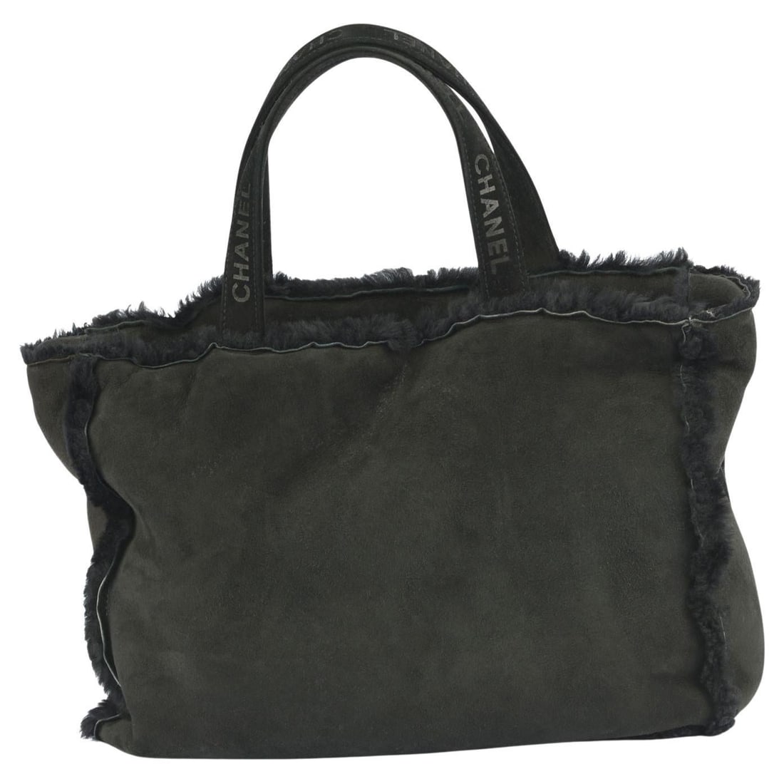 Chanel Black Suede Shearling Tote from Collection 5: Chanel Black Suede Shearling Tote from Collection 5 Introducing the Chanel Black Shearling Trim Tote, a stunning accessory that combines luxury and practicality. This tote features a chic design with 
