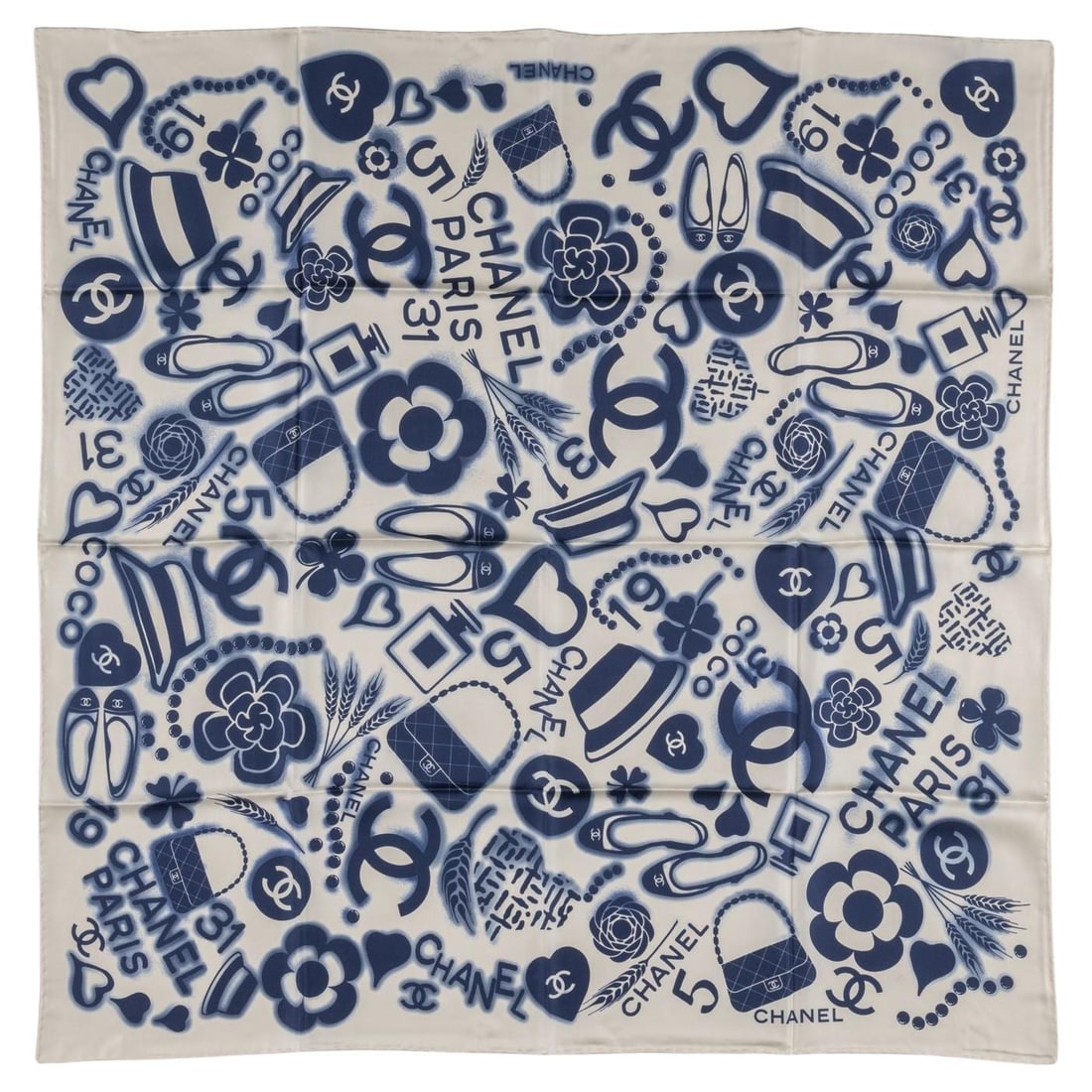 Chanel Foulard silk scarf blue and white Coco print: Chanel Foulard silk scarf blue and white Coco print Chanel Foulard Blanco Azul scarf in 100% silk, featuring a blue and white Coco Chanel print. This piece is in un-used, unused condition. Specificati
