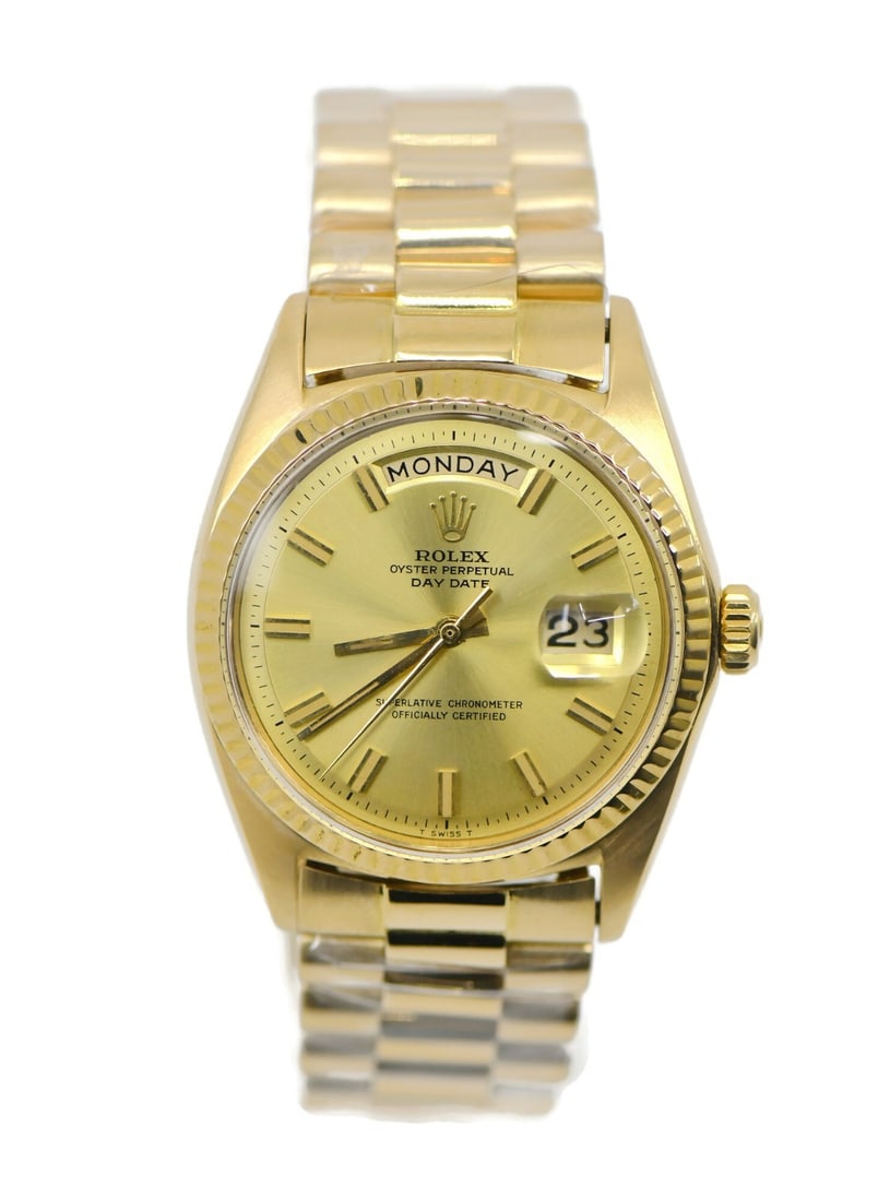 Rolex Day-Date 18K Yellow Gold 1969 Automatic Wristwatch 1803: Rolex Day-Date 18K Yellow Gold 1969 Automatic Wristwatch 1803 This Rolex Day-Date wristwatch, reference 1803, features a 36mm case crafted from 18K yellow gold. Designed for men, it is powered by a me