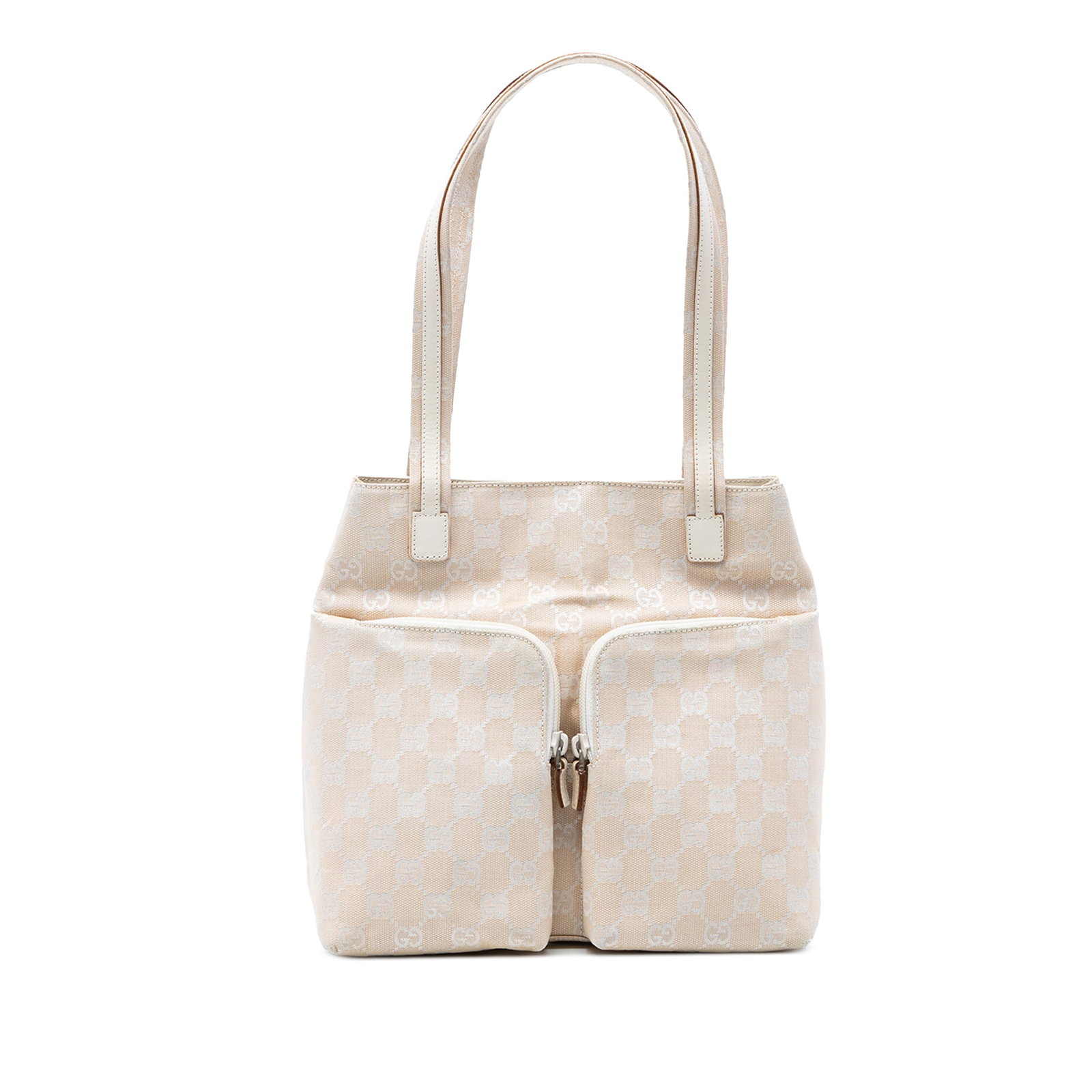 Gucci GG Canvas Beige Tote Bag: Gucci GG Canvas Beige Tote Bag This Gucci GG Canvas Tote features a beige fabric body with the iconic GG pattern, flat straps, and an open top secured by a magnetic closure. It includes exterior front
