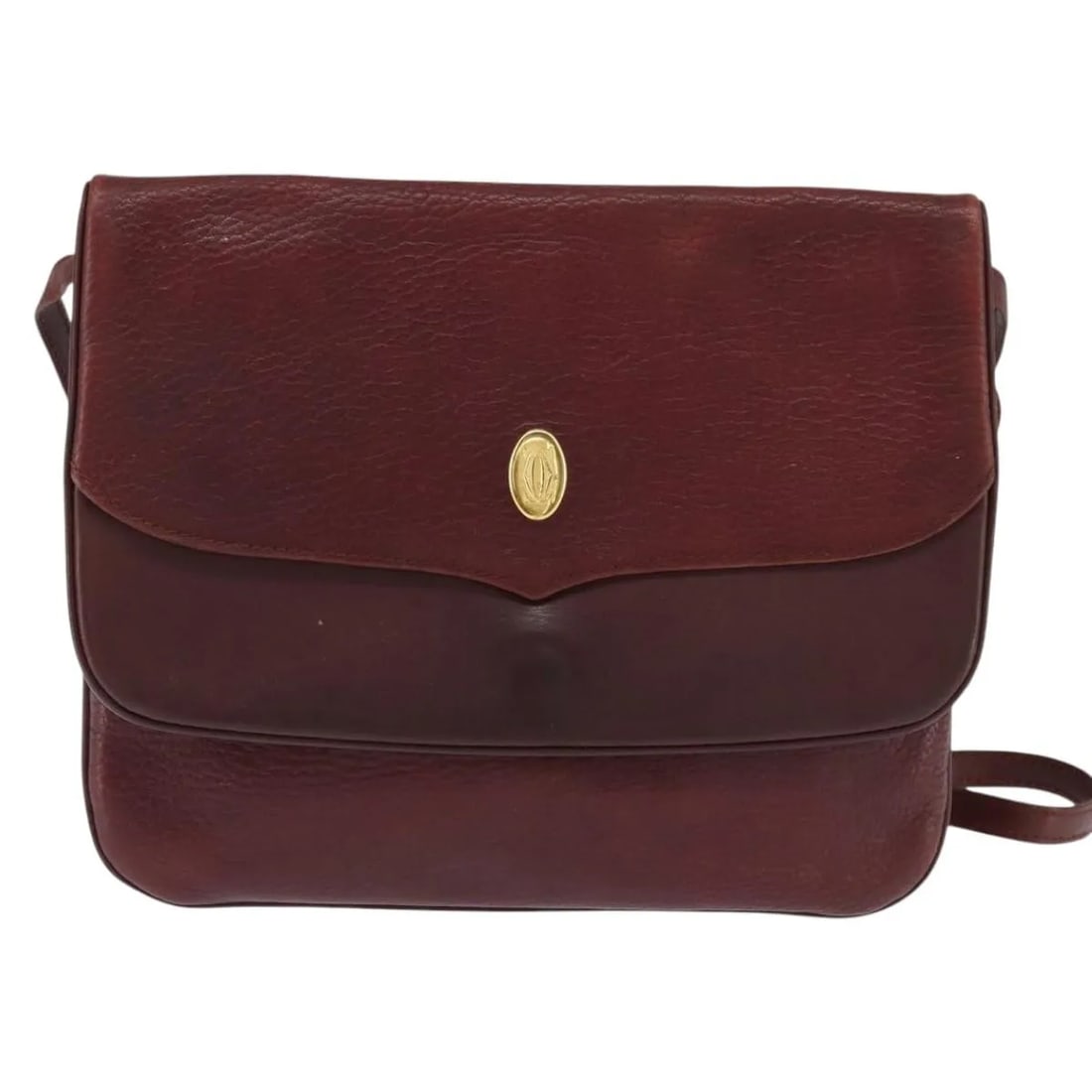 Cartier Must de Cartier Burgundy Leather Shoulder Bag: Cartier Must de Cartier Burgundy Leather Shoulder Bag The Must de Cartier Shoulder Bag is crafted from burgundy leather and designed for women. This pre-owned bag shows noticeable signs of use, includ
