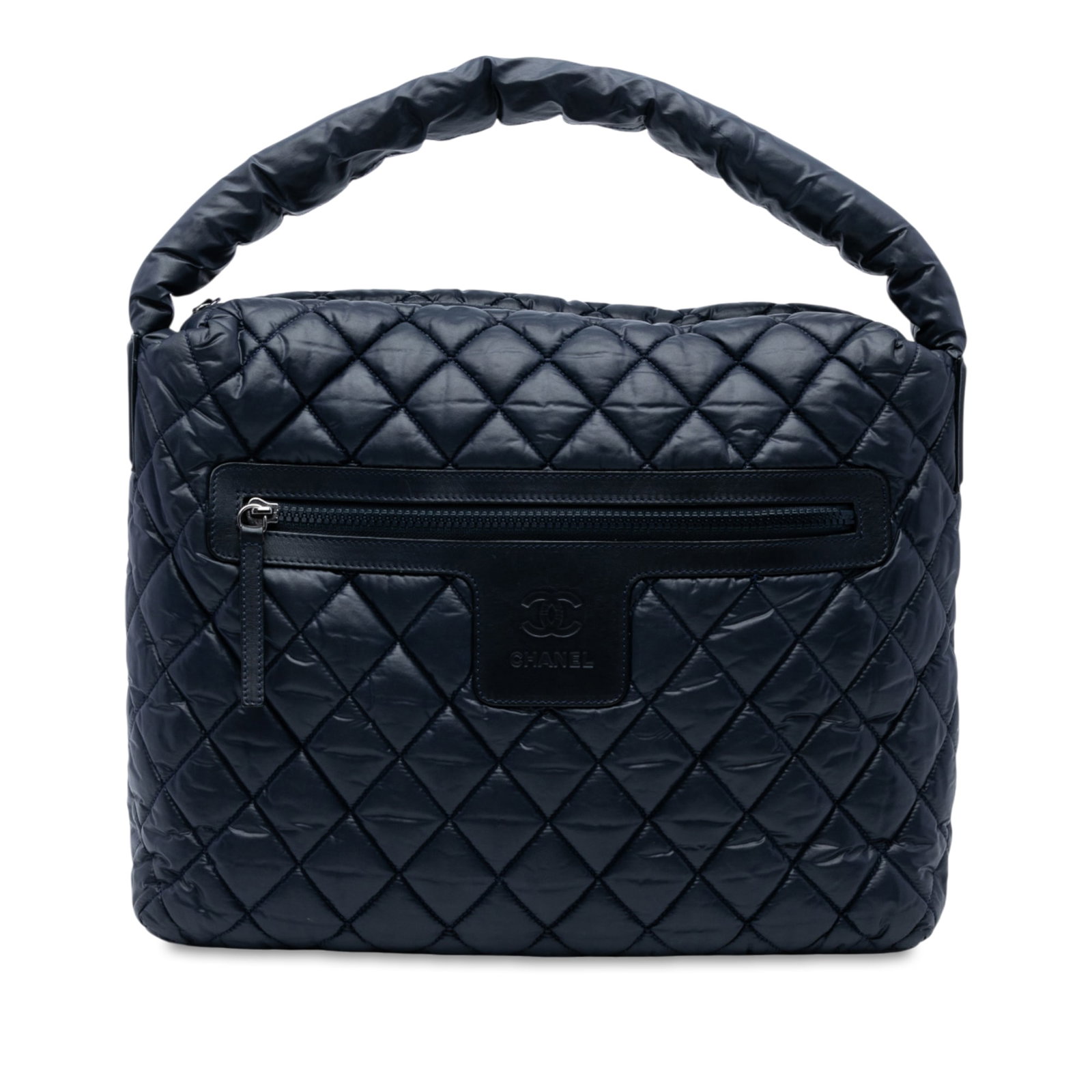 Chanel Quilted Nylon Coco Cocoon Hobo Bag Blue Italy: Chanel Quilted Nylon Coco Cocoon Hobo Bag Blue Italy The Chanel Quilted Nylon Coco Cocoon Hobo is a stylish handbag crafted from high-quality quilted nylon. It features a durable nylon handle and a se