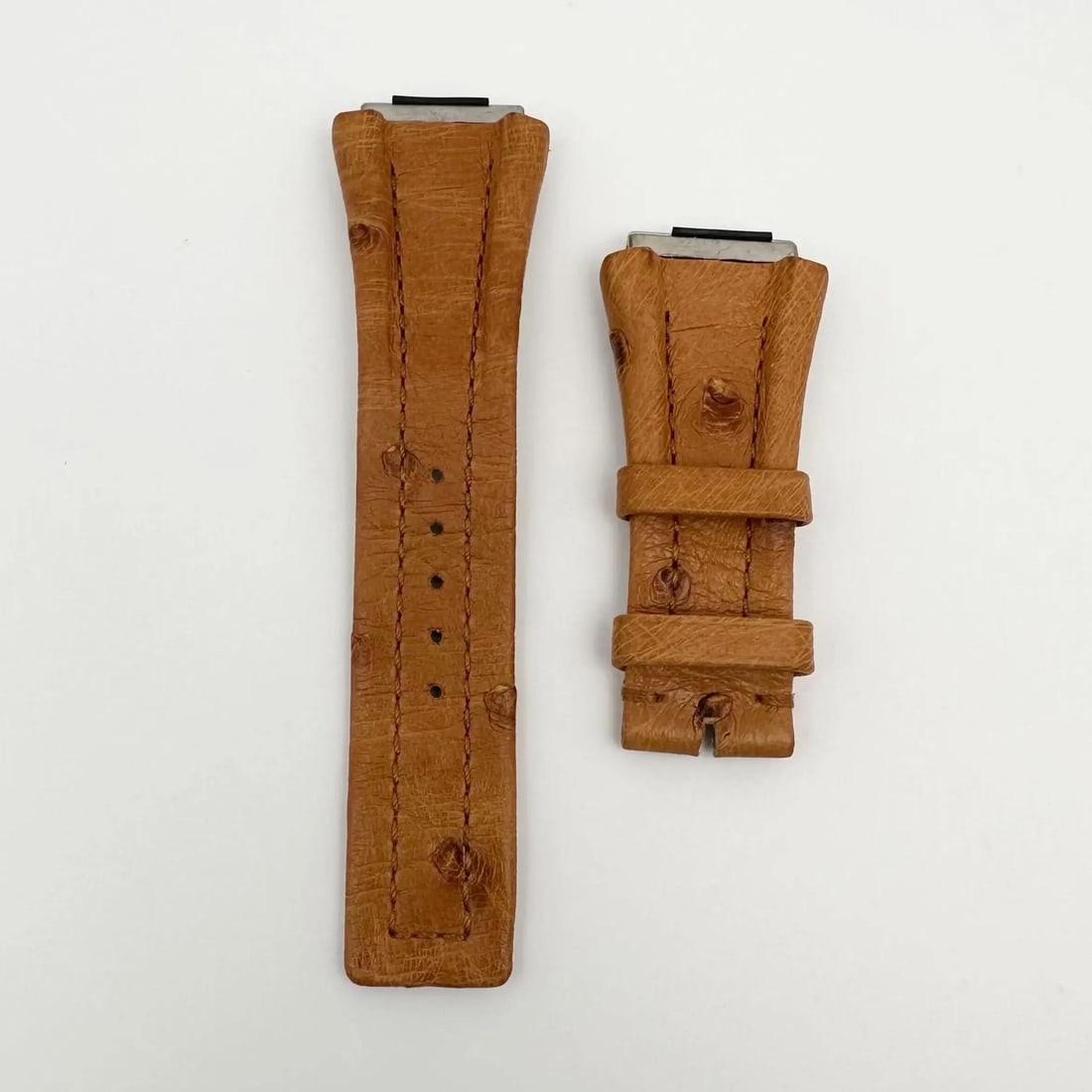 Bvlgari 27mm Brown Calf Leather Two-Piece Watch Strap 100116560: Bvlgari 27mm Brown Calf Leather Two-Piece Watch Strap 100116560 Elevate your timepiece with this exquisite Bvlgari wristwatch band crafted from luxurious brown calf leather. This two-piece strap is de
