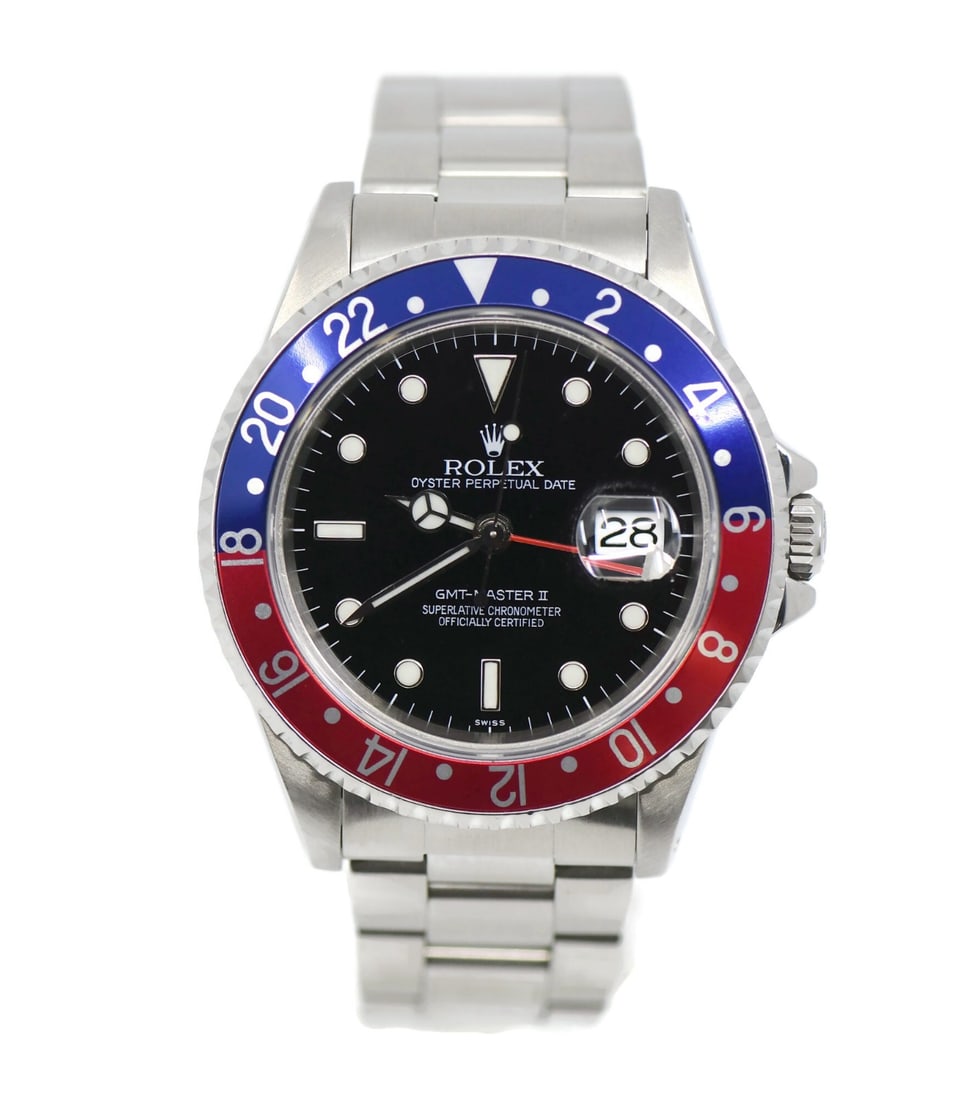 Rolex 16710 GMT-Master II stainless steel wristwatch with box: Rolex 16710 GMT-Master II stainless steel wristwatch with box Rolex GMT-Master II wristwatch in stainless steel, reference 16710, with a black dial and analog display. It features a mechanical automat