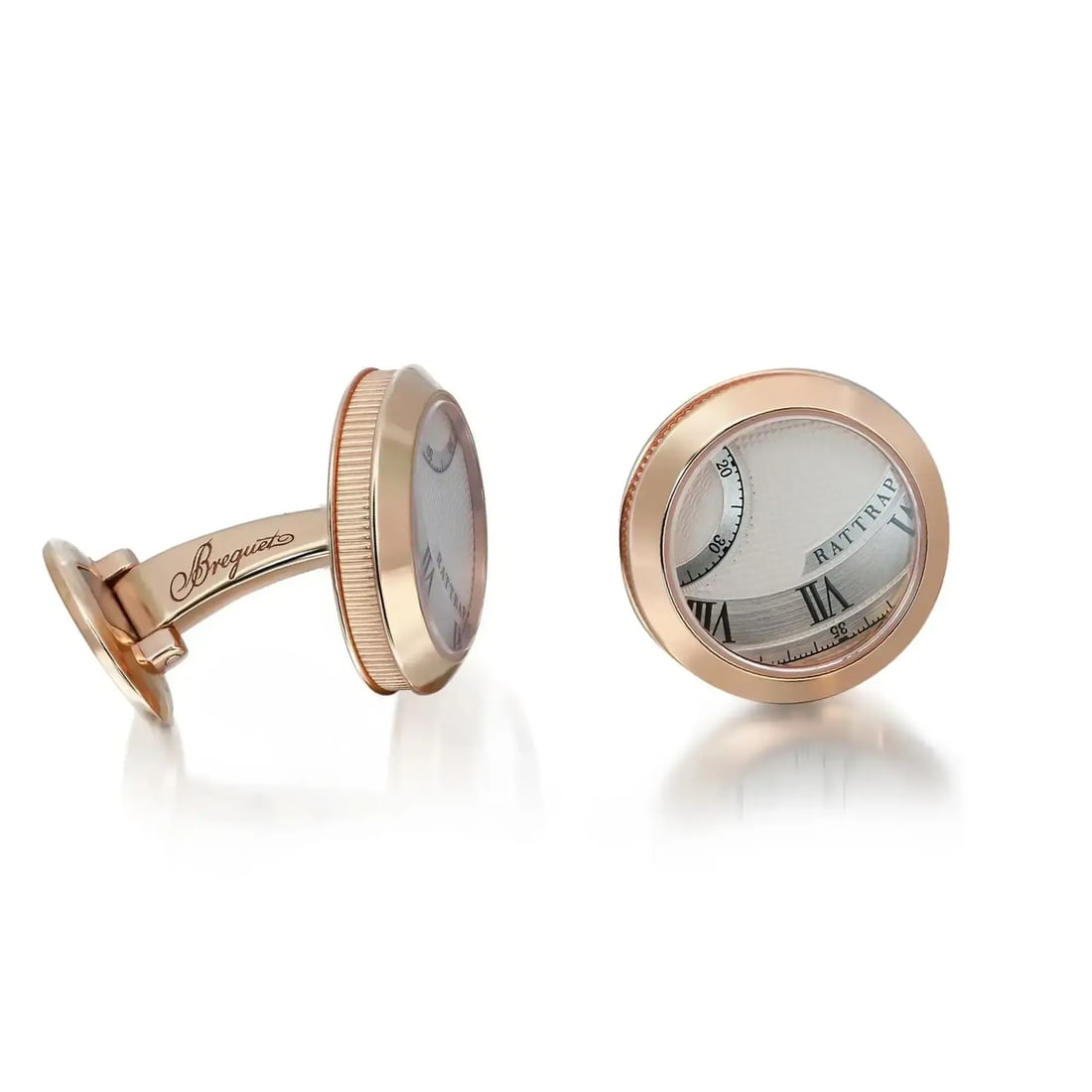 Breguet 18K Rose Gold Cadran Guilloche Round Cufflinks: Breguet 18K Rose Gold Cadran Guilloche Round Cufflinks Elevate your formal attire with these exquisite Breguet Cadran Guilloche Round Shape Cufflinks. Crafted in luxurious 18K rose gold, these cufflin