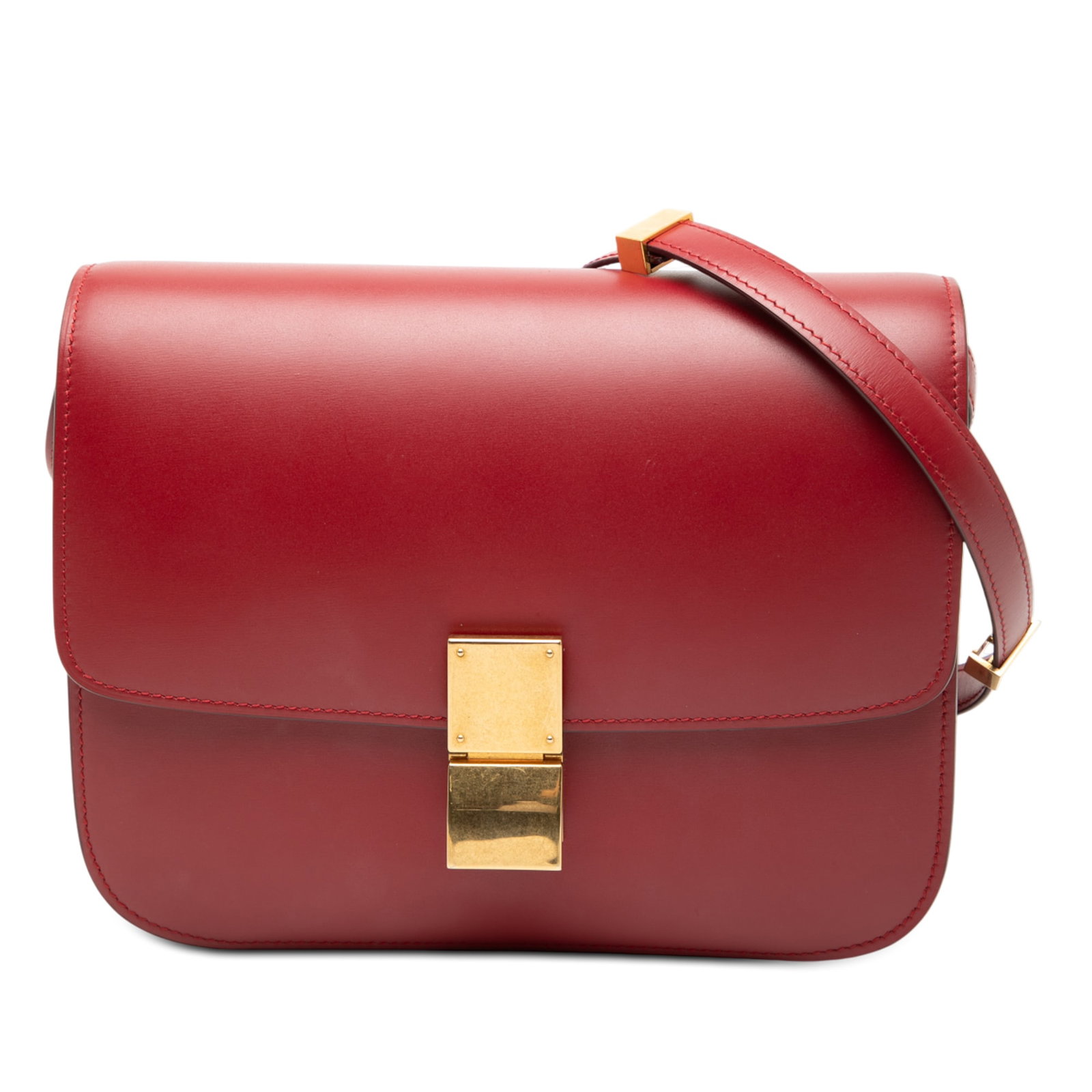 Celine Classic Box Medium Red Leather Crossbody Bag: Celine Classic Box Medium Red Leather Crossbody Bag The Celine Medium Calfskin Classic Box is a red crossbody bag crafted from leather. It features an adjustable flat leather strap, a front flap secur