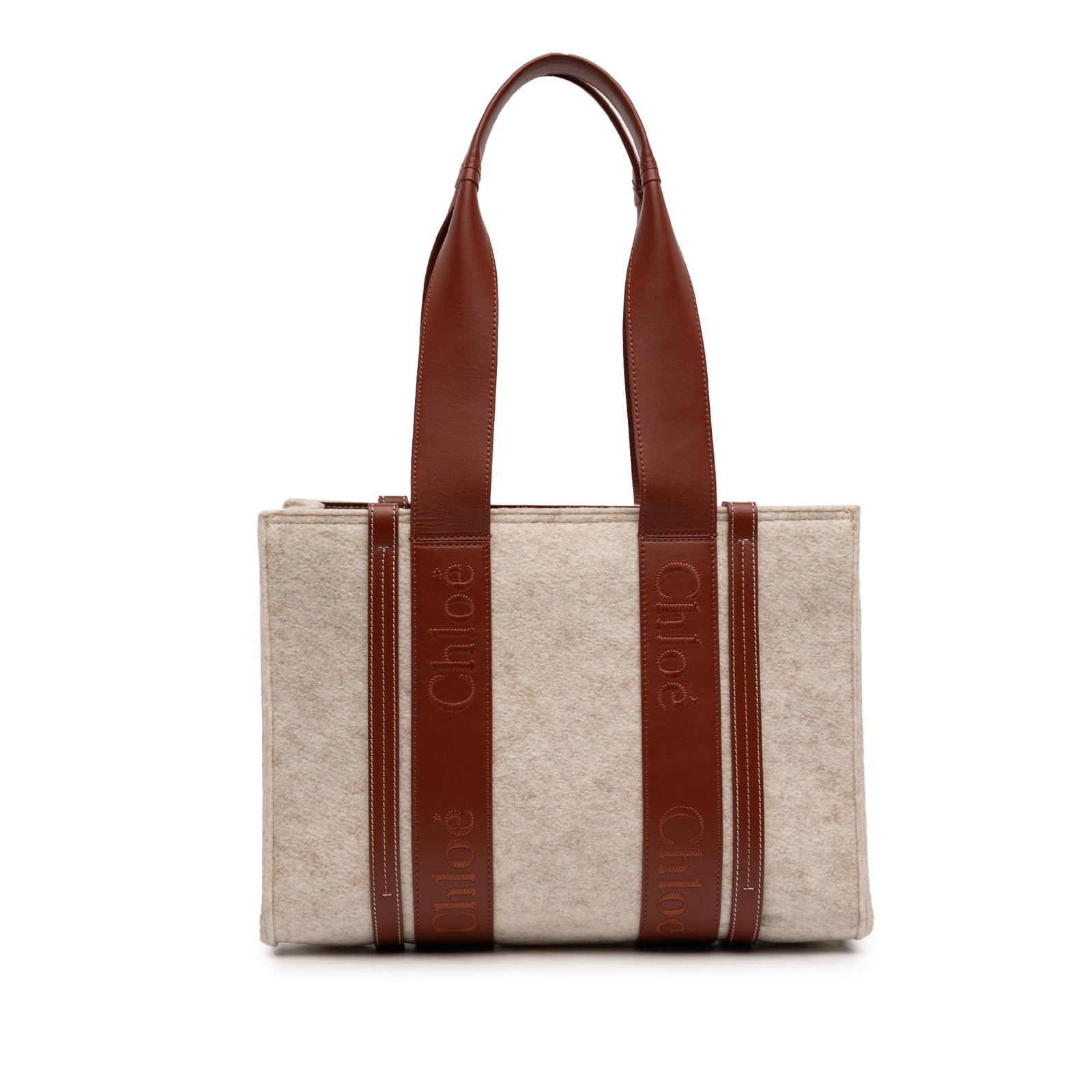 Medium Woody Tote Bag in Felt and Leather by Chloe: Medium Woody Tote Bag in Felt and Leather by Chloe This Chloe Medium Felt Woody Tote features a felt body with leather trim, flat leather handles, an open top, and interior zip and slip pockets. The b