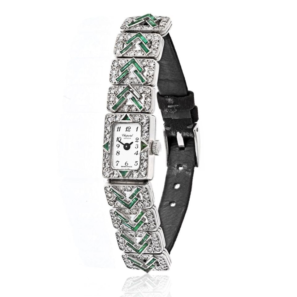 Chopard Vintage Platinum Art Deco Diamond Emerald Watch: Chopard Vintage Platinum Art Deco Diamond Emerald Watch Discover the charm of the Art Deco era with this stunning Chopard vintage watch, crafted from luxurious platinum. This exquisite timepiece featu