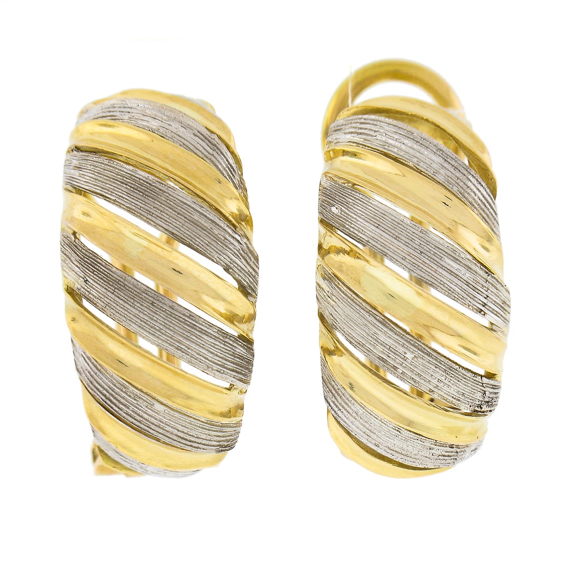 Italian 18k Two Tone Gold Textured Omega Back Cuff Earrings: Italian 18k Two Tone Gold Textured Omega Back Cuff Earrings These exquisite Italian cuff earrings are crafted from solid 18k yellow and white gold, showcasing a stunning textured and polished finish. 