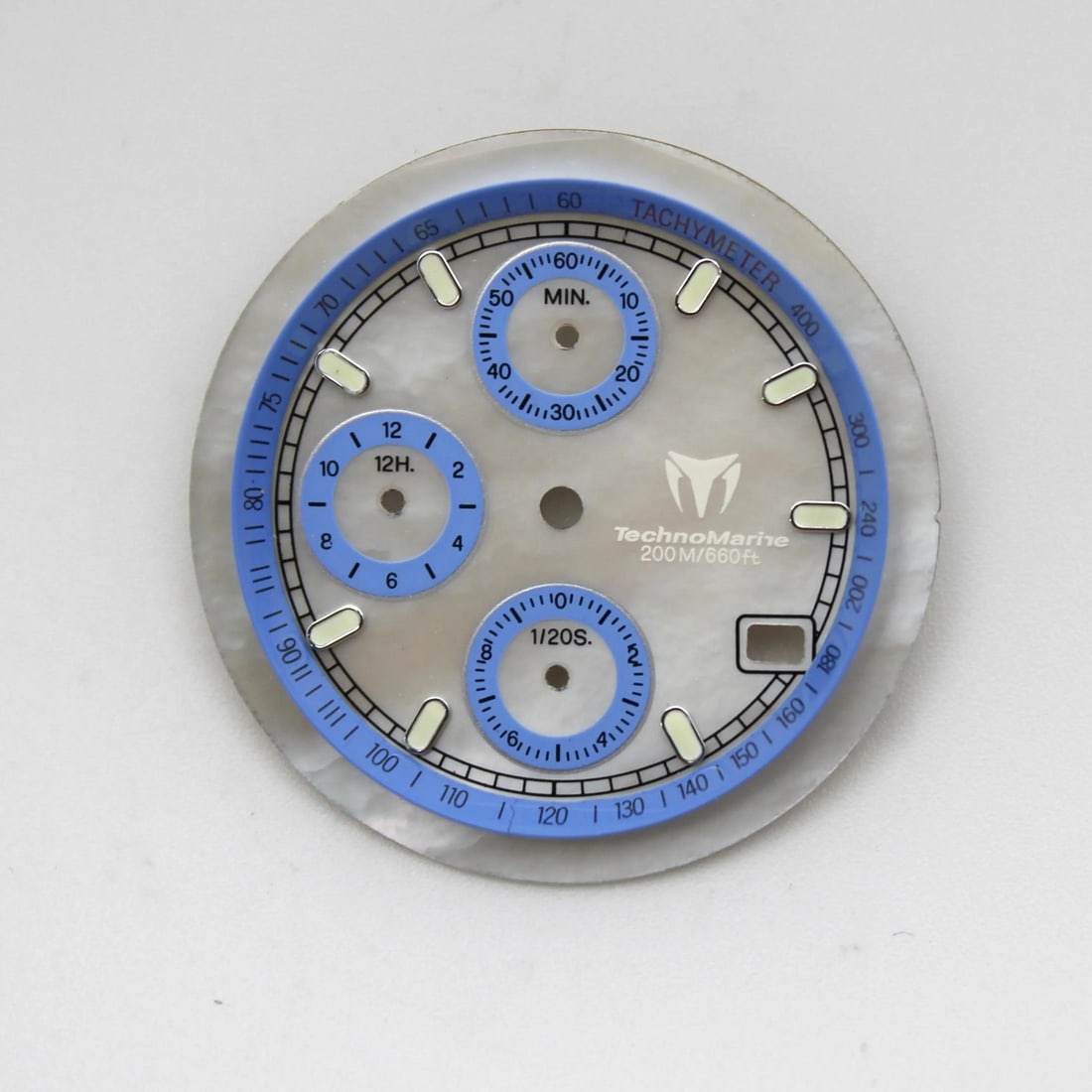 Technomarine Cruise 30mm Mother of Pearl Dial for 36mm Men's Watch: Technomarine Cruise 30mm Mother of Pearl Dial for 36mm Men's Watch Enhance your Technomarine Cruise watch with this stunning 30mm Mother of Pearl dial featuring blue sub-dials. Designed for a 36mm men