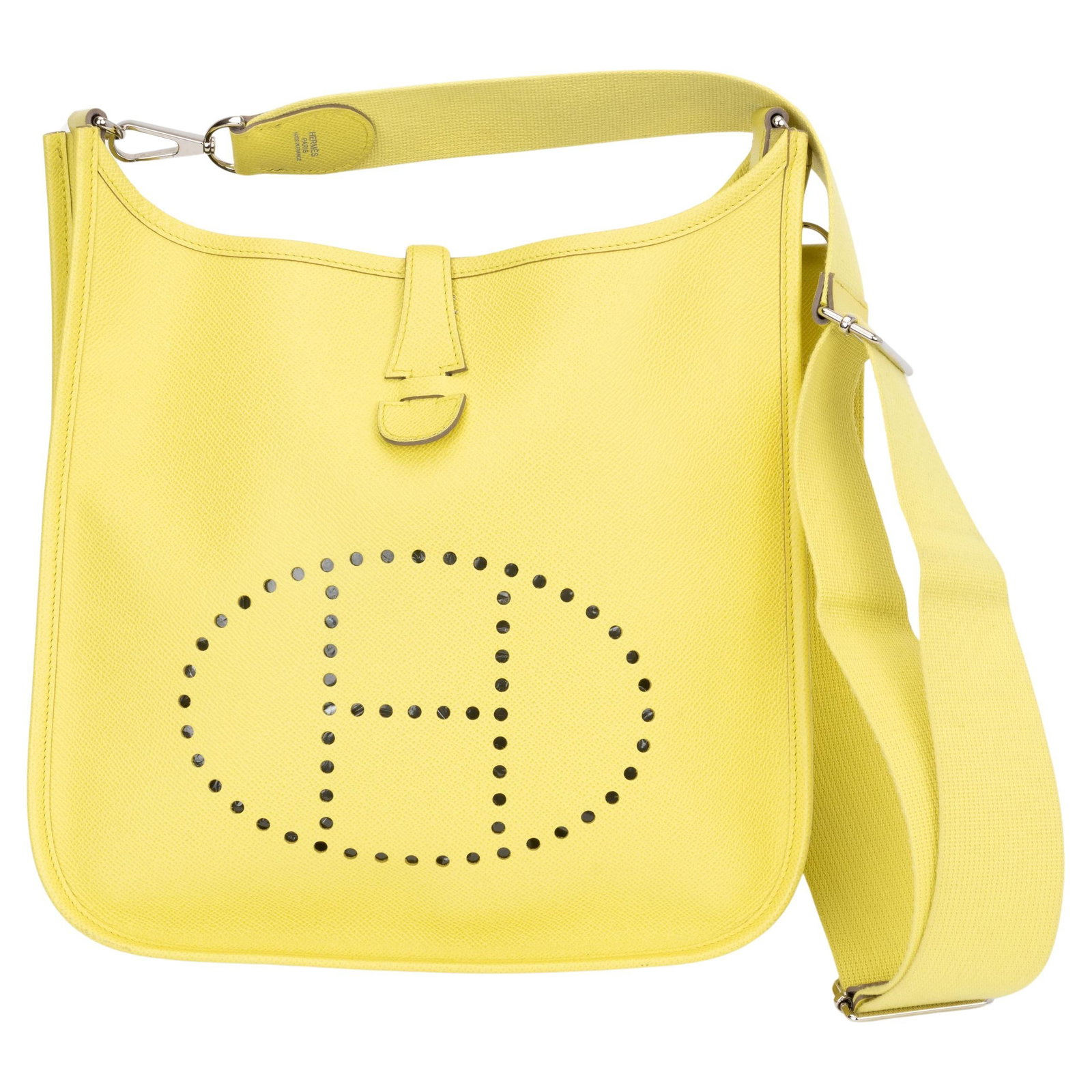 Hermes Jaune Poussin Epsom Evelyne PM Handbag with Palladium Hardware: Hermes Jaune Poussin Epsom Evelyne PM Handbag with Palladium Hardware Introducing the Hermes Jaune Poussin Epsom Evelyne PM, a stunning medium-sized handbag crafted from luxurious Epsom leather. This 