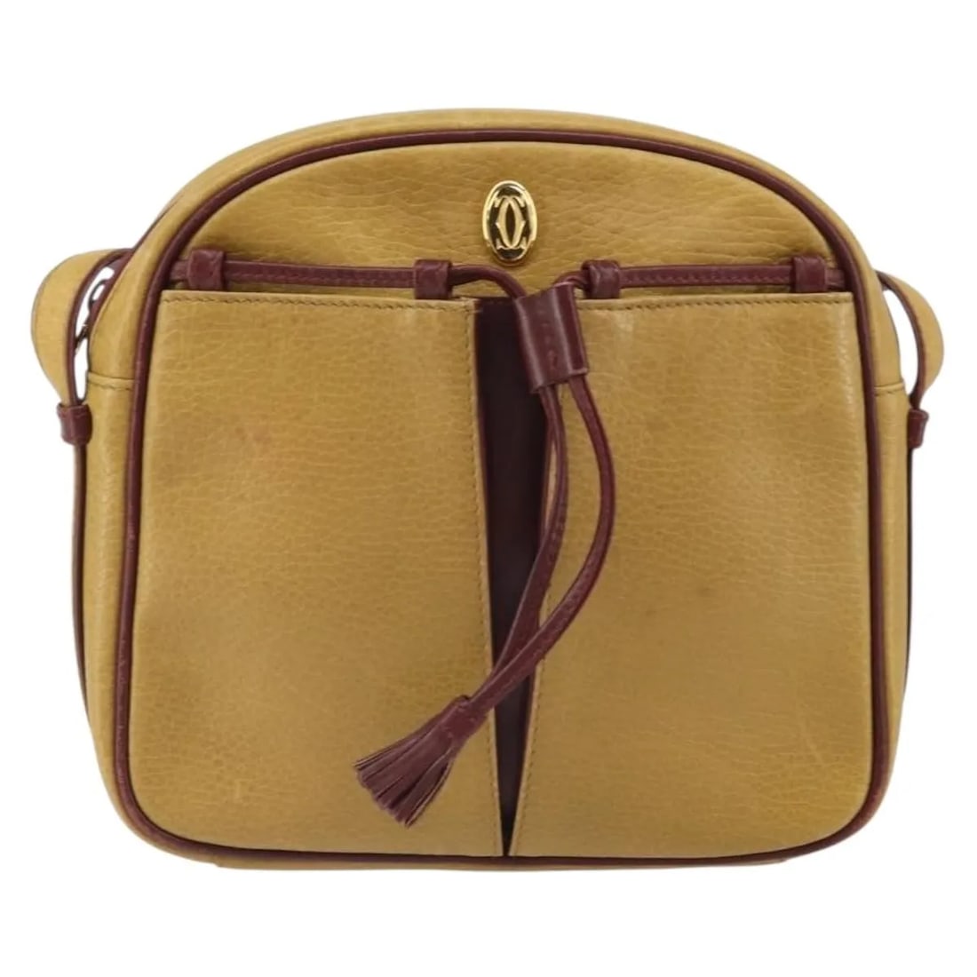 Cartier Must de Cartier Tasseled Leather Crossbody Bag Yellow: Cartier Must de Cartier Tasseled Leather Crossbody Bag Yellow This Cartier Tasseled Must de Cartier crossbody bag features a yellow leather exterior with a tassel accent. Designed for women, it includ
