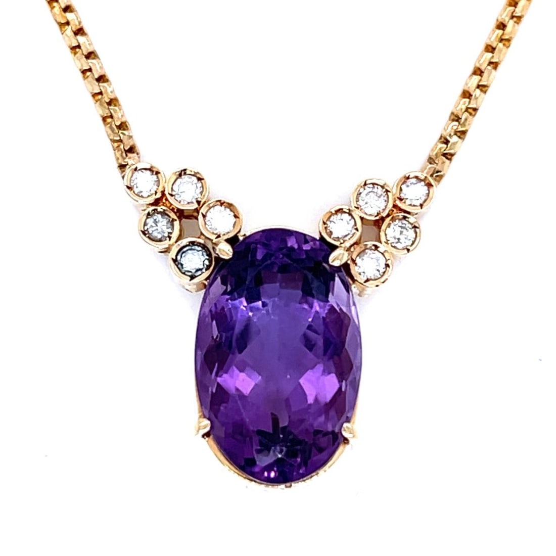 Amethyst and Diamond Pendant Necklace in 14K Yellow Gold 15 Inch: Amethyst and Diamond Pendant Necklace in 14K Yellow Gold 15 Inch This pre-owned necklace features an approximately 8.00 carat amethyst set in 14K yellow gold, accented by 10 diamonds totaling approxim