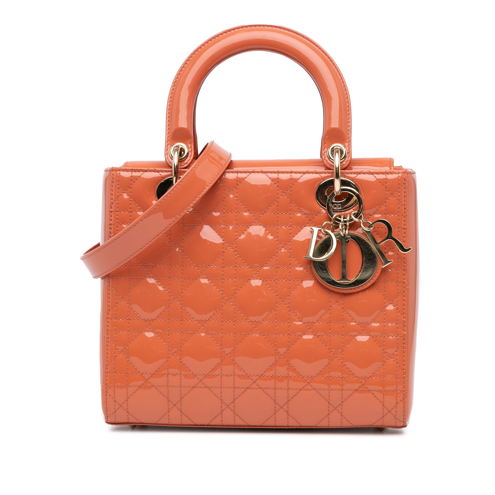 Dior Medium Patent Cannage Lady Dior Orange Leather Handbag: Dior Medium Patent Cannage Lady Dior Orange Leather Handbag Introducing the Medium Patent Cannage Lady Dior, a stunning handbag crafted from quilted patent leather in a vibrant orange hue. This elegan