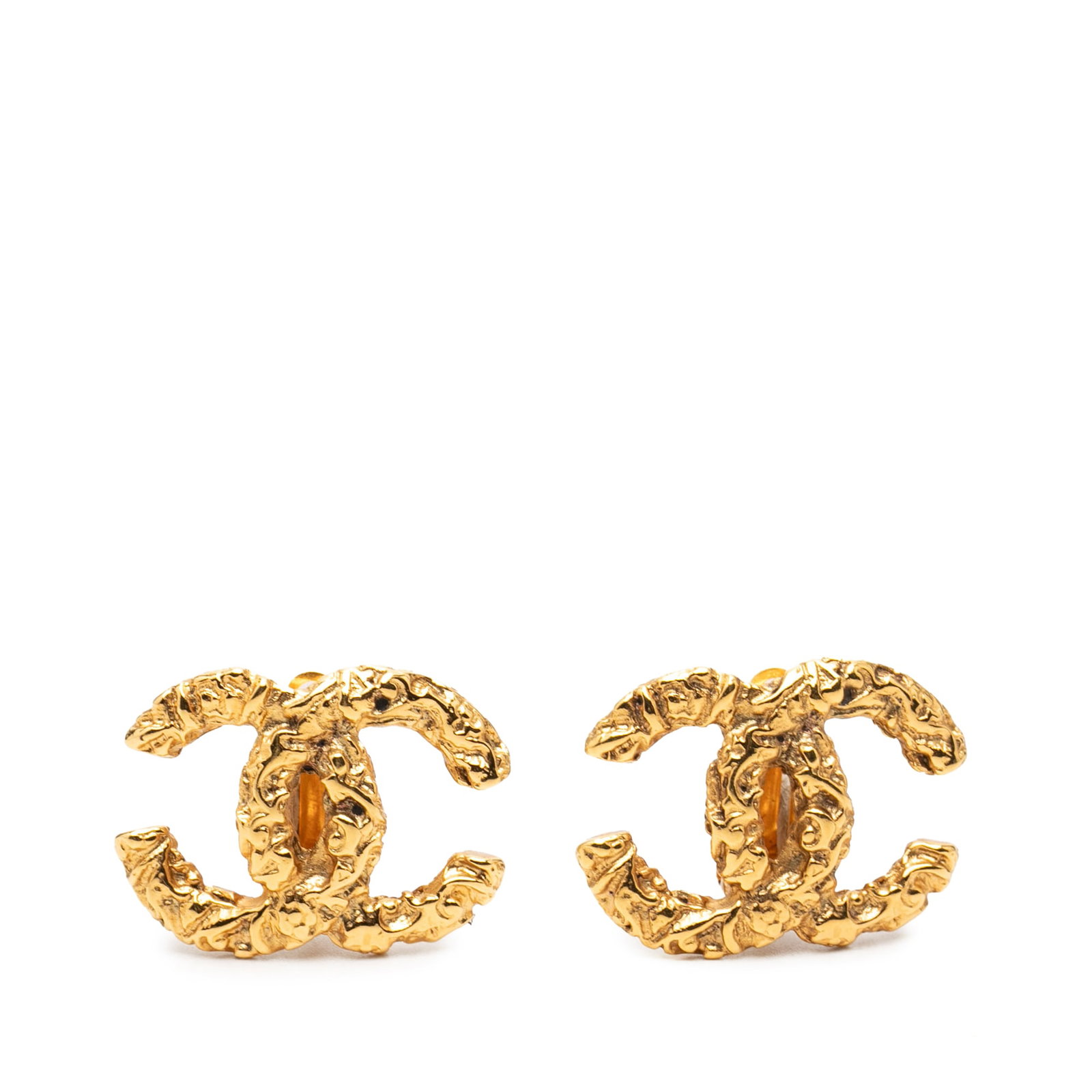 Chanel Lava CC Gold Plated Clip On Earrings: Chanel Lava CC Gold Plated Clip On Earrings These Chanel CC Gold Plated Lava Clip On Earrings feature a gold-tone metal body with secure clip-on closures. Crafted in France, these costume earrings dis