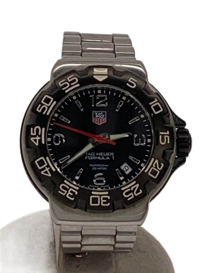 TAG Heuer Formula 1 Stainless Steel Quartz Men's Wristwatch WAC1110-0: TAG Heuer Formula 1 Stainless Steel Quartz Men's Wristwatch WAC1110-0 This TAG HEUER Formula1 Quartz WAC1110-0 men's wristwatch features a stainless steel case and band. Made in Switzerland, it is des