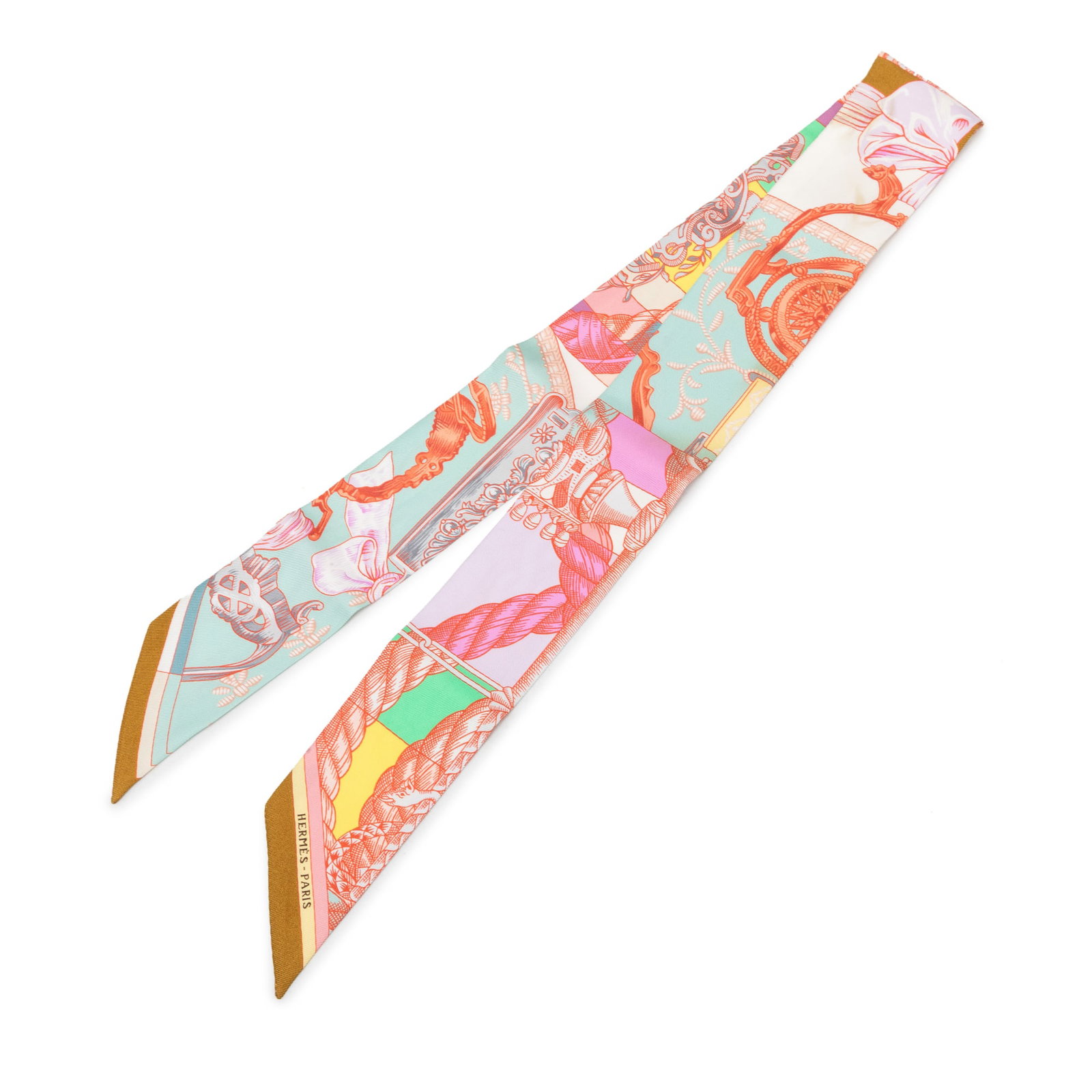 Hermes Cavalleria d Etriers Pink Silk Twilly: Hermes Cavalleria d Etriers Pink Silk Twilly Hermes Cavalleria d Etriers Silk Twilly Scarf in pink, featuring the Cavalleria d Etriers print on 100% silk. Made in France and classified as an accessori