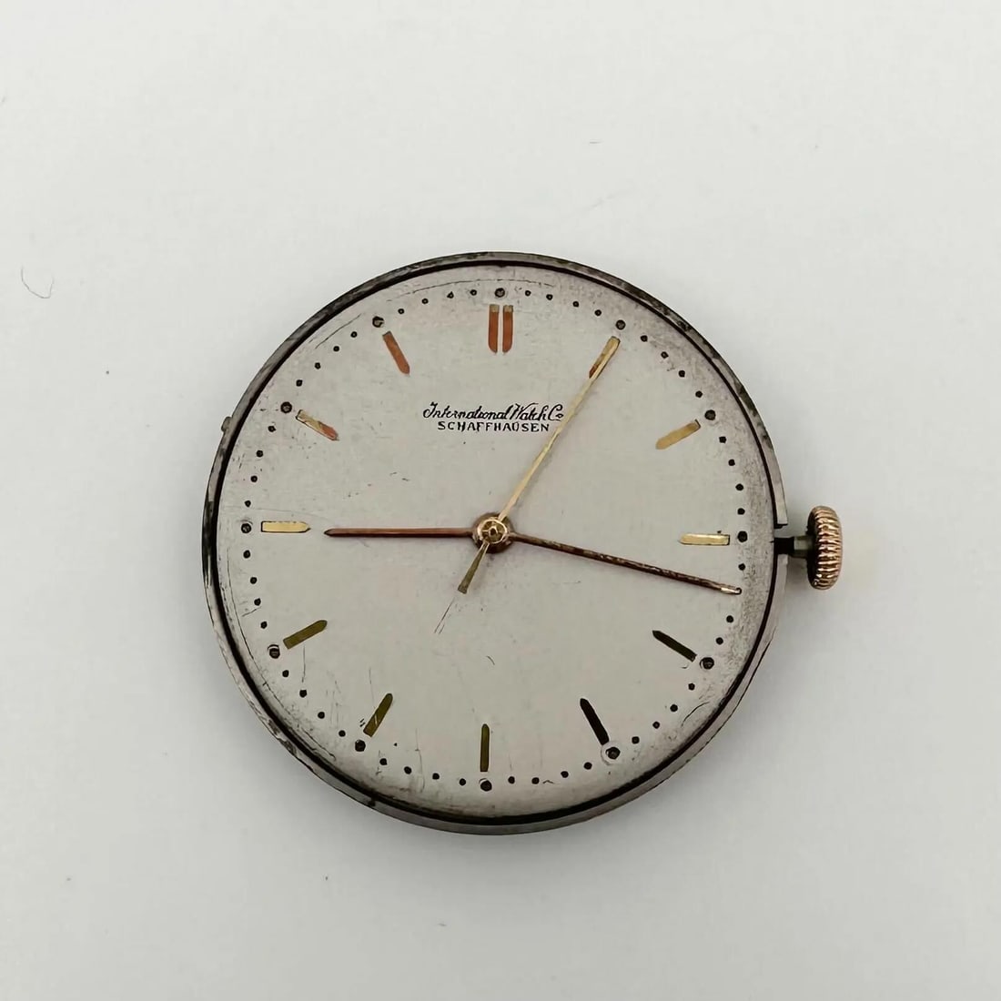 IWC White Dial Calibre C89 Mechanical Movement: IWC White Dial Calibre C89 Mechanical Movement This IWC movement features a classic white dial, highlighting its refined aesthetics. It operates using a mechanical (manual) movement, specifically the 