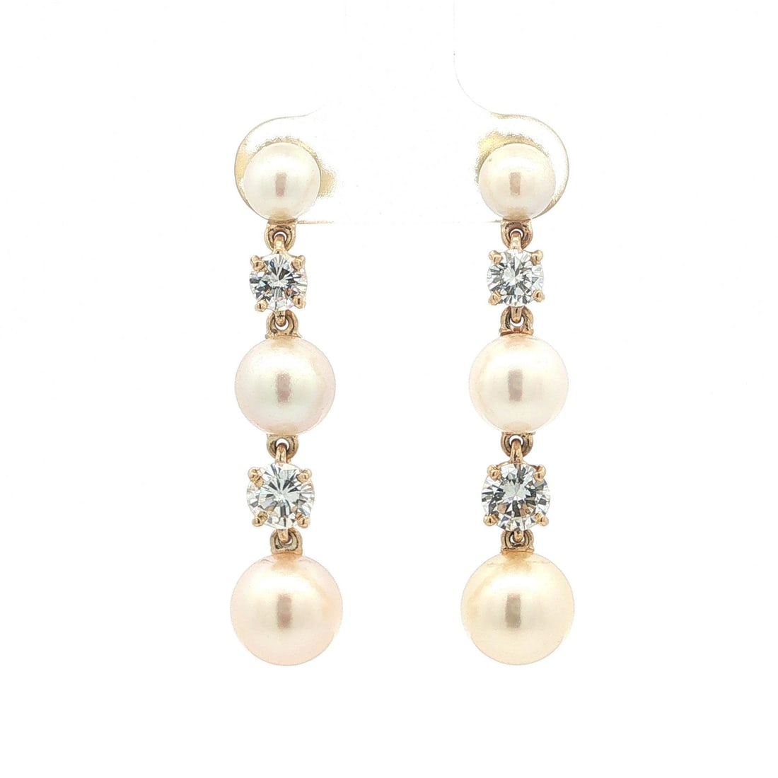 14k Yellow Gold Pearl and 1.45ctw Diamond Drop Earrings: 14k Yellow Gold Pearl and 1.45ctw Diamond Drop Earrings Elegant dangle earrings crafted in solid 14k yellow gold, featuring an alternating graduated design with natural diamonds and cultured pearls. T