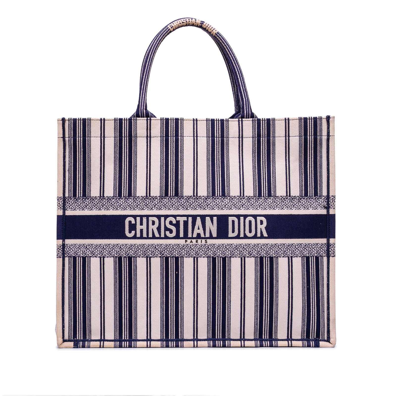 Dior Book Tote Blue Striped Large Canvas Bag from Italy: Dior Book Tote Blue Striped Large Canvas Bag from Italy This Dior Large Canvas Striped Book Tote features a blue striped fabric exterior, rolled top handles, and an open top design. Crafted in Italy, 