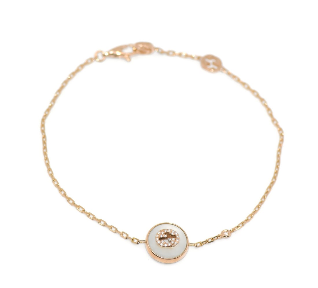 18K Rose Gold Gucci Chain Bracelet with Diamonds 8 Inch: 18K Rose Gold Gucci Chain Bracelet with Diamonds 8 Inch This Gucci bracelet features a chain style crafted from 18k rose gold and is adorned with diamond accents. It measures 8 inches in length and we