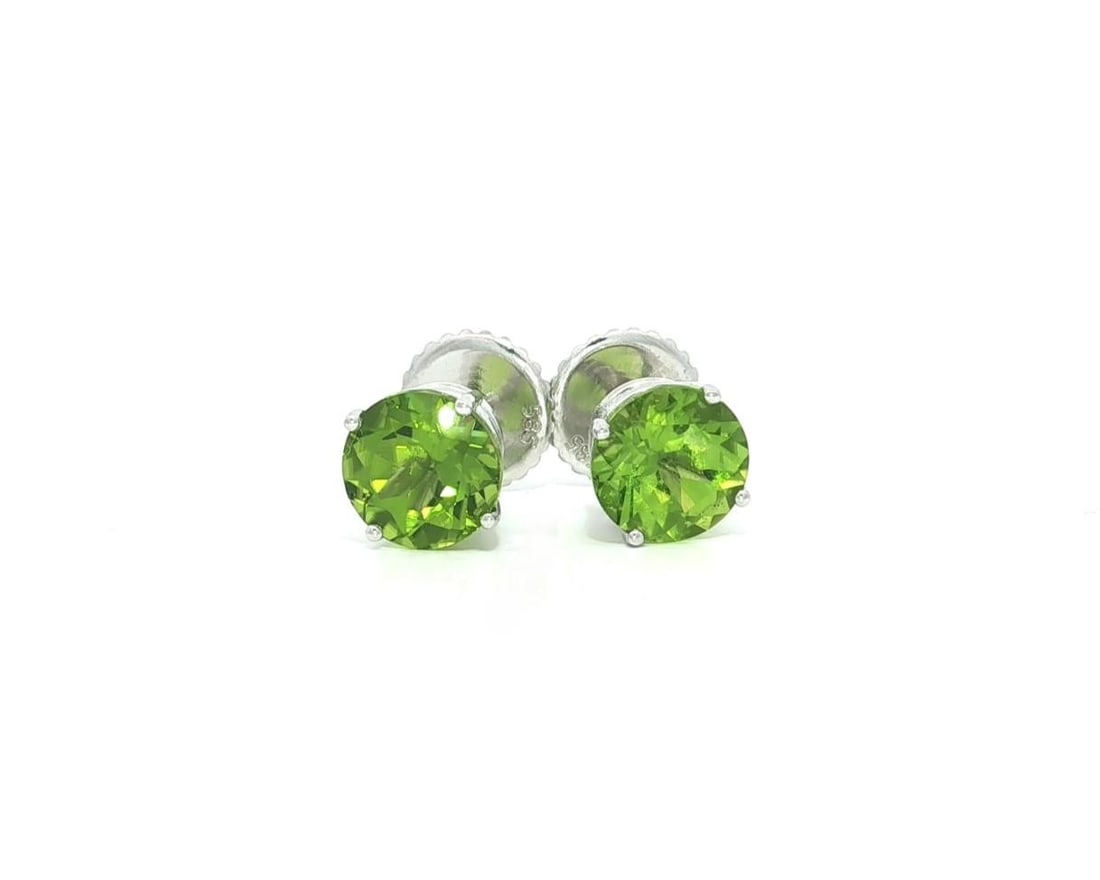 14k White Gold 4.41ctw Green Peridot Stud Earrings Screw Back: 14k White Gold 4.41ctw Green Peridot Stud Earrings Screw Back Elevate your style with these stunning stud earrings crafted from solid 14k white gold. Featuring two natural genuine peridot stones, each