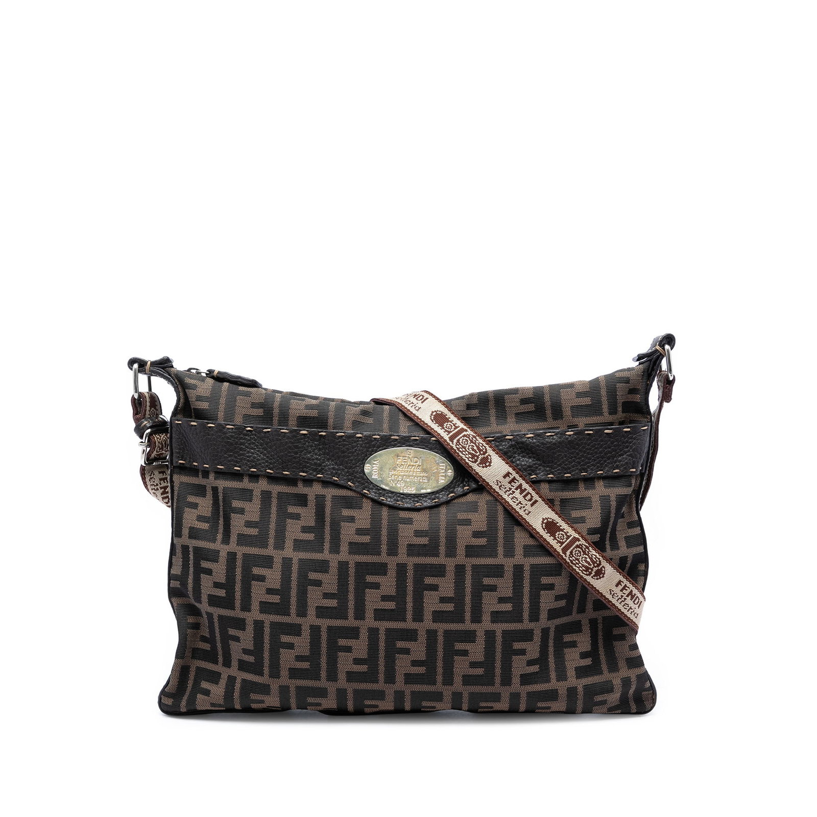 Fendi Selleria Zucca Canvas Crossbody Bag Brown: Fendi Selleria Zucca Canvas Crossbody Bag Brown Fendi Zucca Canvas Selleria Crossbody bag in brown fabric with leather trim. It features an adjustable flat shoulder strap, top zip closure, and an inte