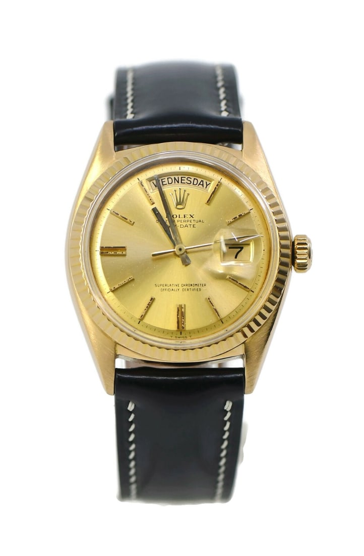 Rolex Day-Date 18K Yellow Gold Watch Model 1803 with Box: Rolex Day-Date 18K Yellow Gold Watch Model 1803 with Box Experience timeless luxury with this Rolex Day-Date wristwatch. Crafted from 18K yellow gold, this watch features a stunning champagne dial and