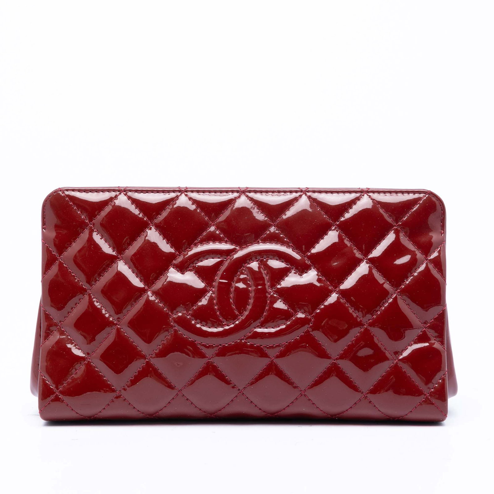 Chanel Timeless CC Patent Leather Quilted Clutch Red: Chanel Timeless CC Patent Leather Quilted Clutch Red Chanel CC Quilted Patent Timeless Clutch in red, made in France. This bag features a quilted patent leather body, an open top with magnetic snap cl