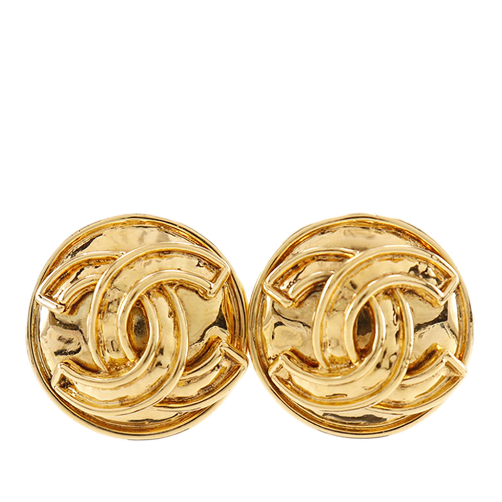 Chanel CC Gold Tone Round Clip On Earrings: Chanel CC Gold Tone Round Clip On Earrings These Chanel CC gold plated round clip-on earrings are crafted from gold-tone metal and feature the iconic CC logo. Designed with secure back clip-on closure