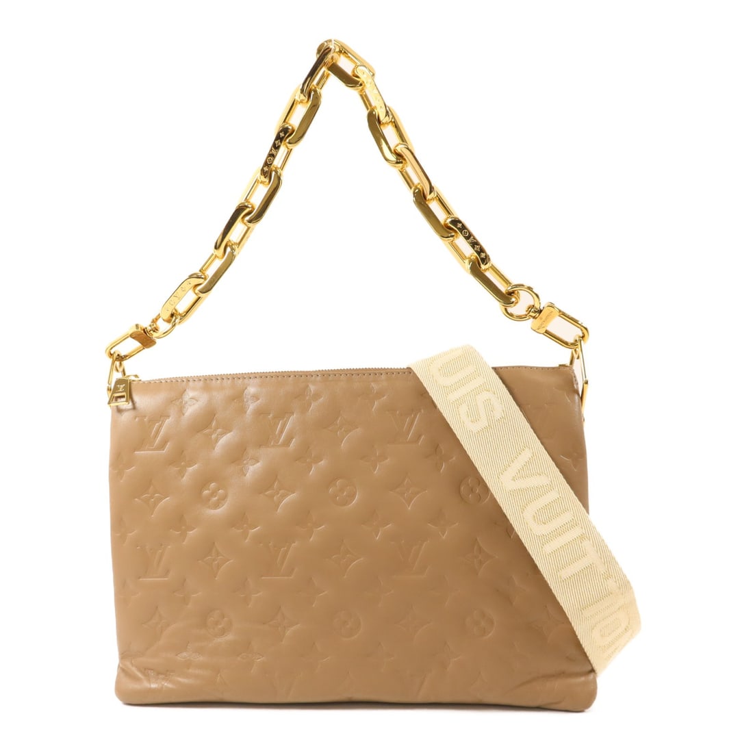 Louis Vuitton Coussin PM Brown Lambskin Shoulder Bag M21276: Louis Vuitton Coussin PM Brown Lambskin Shoulder Bag M21276 The Louis Vuitton Coussin PM shoulder bag features monogram embossed lambskin in a brown and taupe colorway. It is a women's regular-size ba