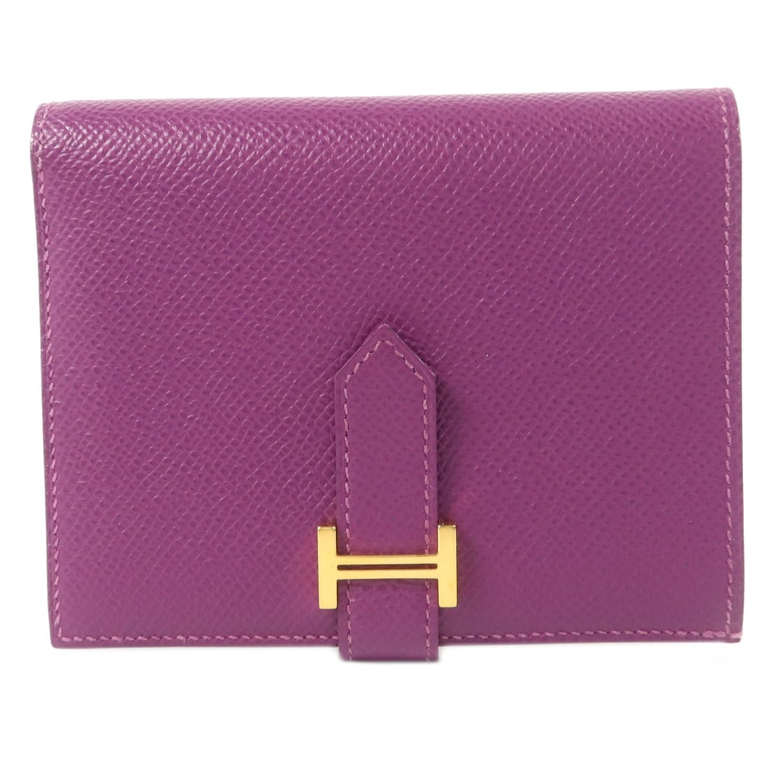 Hermes Bearn bifold wallet in Anemone Epsom calfskin: Hermes Bearn bifold wallet in Anemone Epsom calfskin Bifold wallet in Epsom leather and calfskin (cowhide) in Anemone with a purple-toned accent. It features a belt hardware closure and a practical in