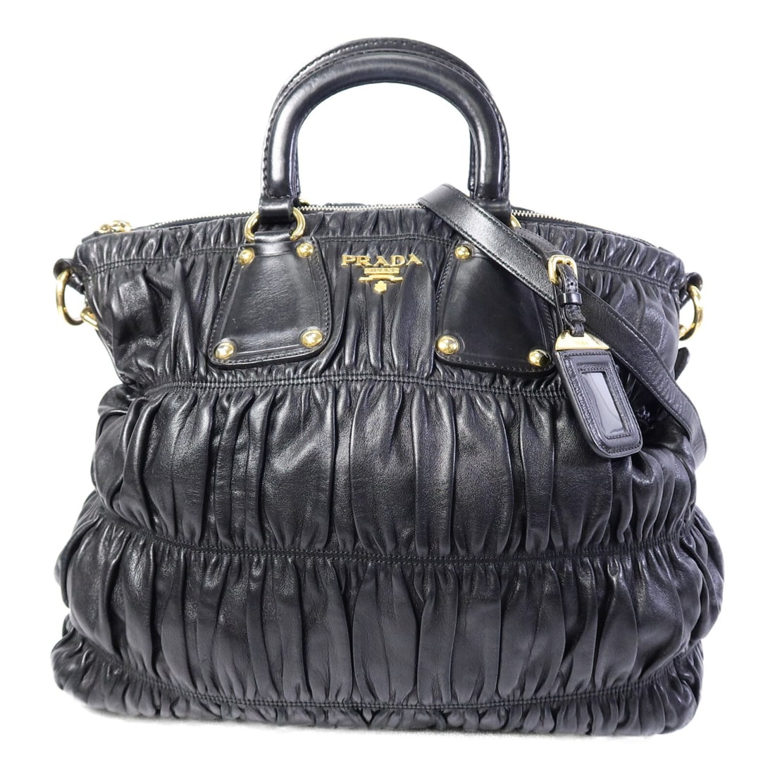 Prada BN1789 Gaufre 2 Way Shoulder Tote Black Lambskin: Prada BN1789 Gaufre 2 Way Shoulder Tote Black Lambskin PRADA GHW Nappa Gaufre Shoulder Tote is a 2-way shoulder bag in black lambskin (sheep leather). It is a regular-size women's bag made in Italy an