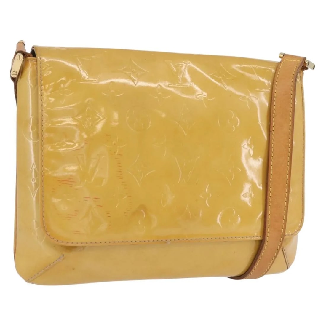 Beige Monogram Vernis Thompson Street Patent Leather Bag by Louis Vuitton: Beige Monogram Vernis Thompson Street Patent Leather Bag by Louis Vuitton This Louis Vuitton Thompson Street handbag features the Monogram Vernis pattern in beige patent leather. Designed for women, i