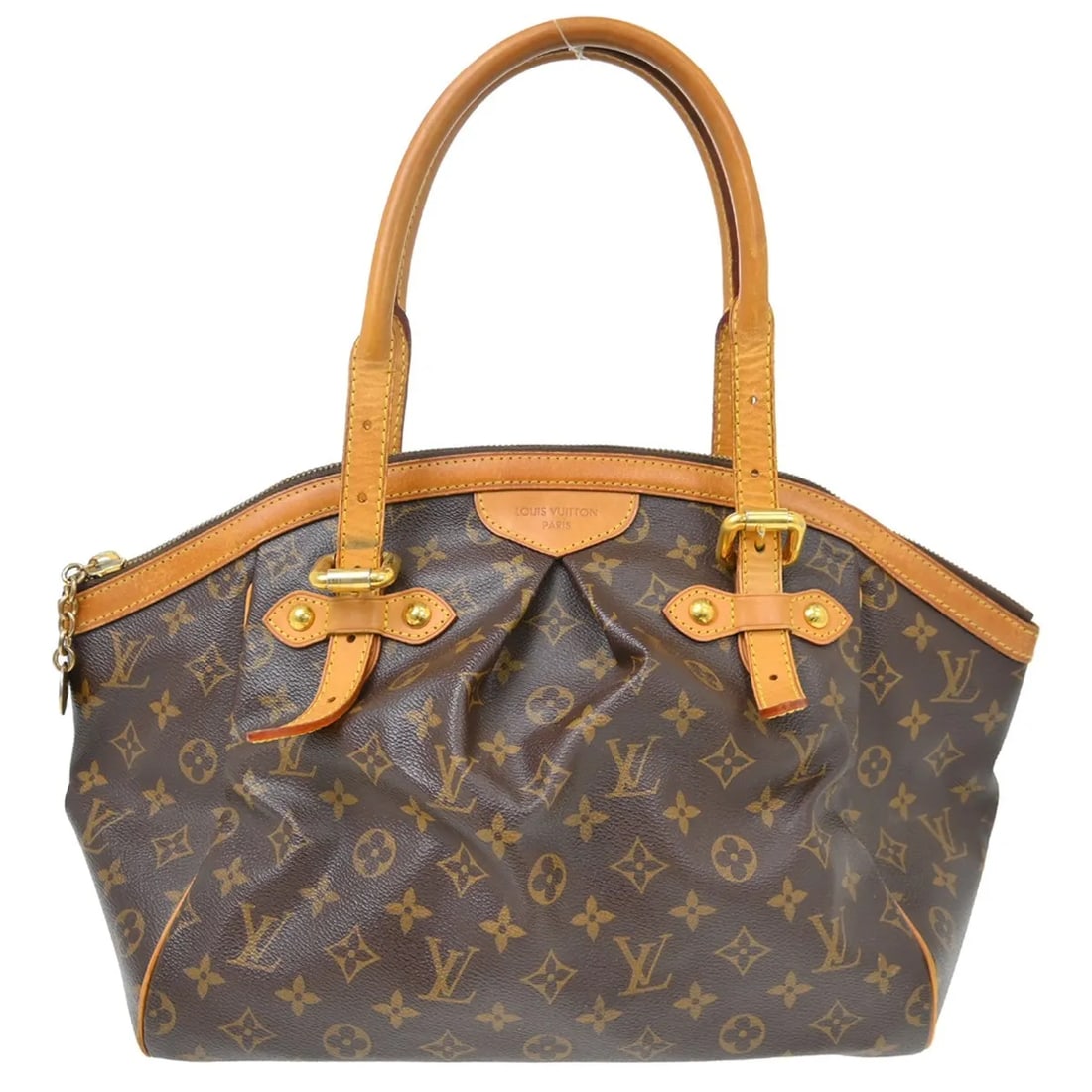 Louis Vuitton Tivoli Handbag in Brown Monogram Canvas: Louis Vuitton Tivoli Handbag in Brown Monogram Canvas This Louis Vuitton Tivoli Handbag features the iconic monogram canvas in brown, crafted for a feminine style. The bag is made in France and offers