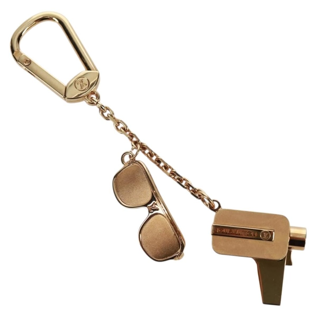 Louis Vuitton M65383 Porte Cles Cannes Metal Key Holder Gold Tone: Louis Vuitton M65383 Porte Cles Cannes Metal Key Holder Gold Tone This is a Louis Vuitton key holder in gold-tone metal, identified as model M65383. It comes with a dust bag and item box. The piece me