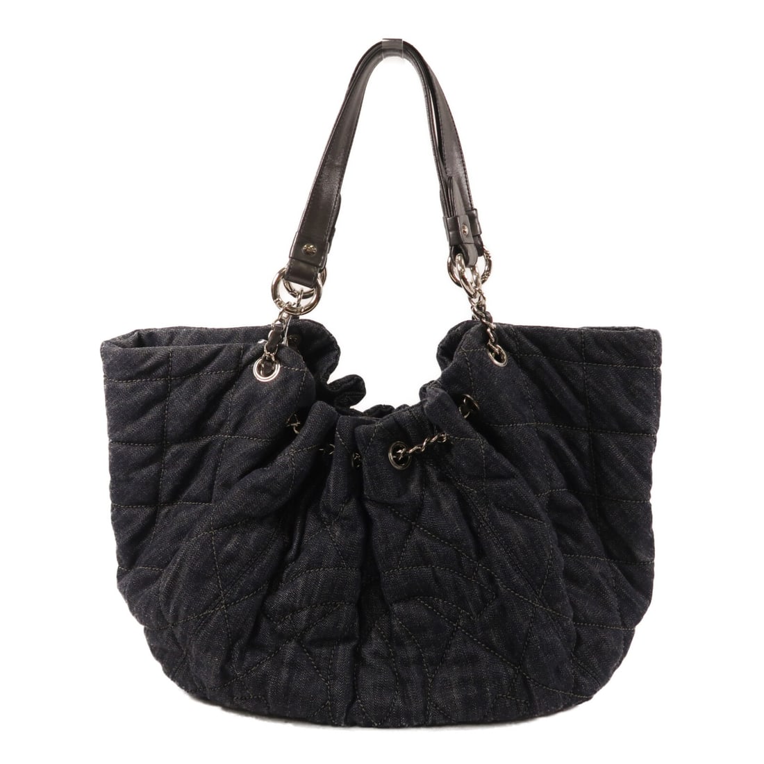 CHANEL Handmade Denim Tote in Navy with Guarantee Card: CHANEL Handmade Denim Tote in Navy with Guarantee Card CHANEL navy denim tote bag in very good AB condition. The bag features a navy x navy colorway, a handle length of 51 cm, and an interior layout w