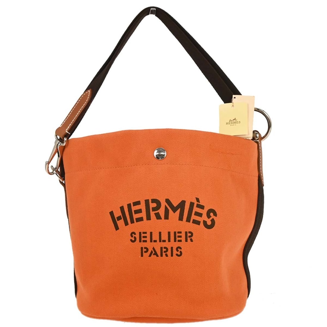 Hermes Sac de Pansage Orange Toile Chevron Bucket Bag: Hermes Sac de Pansage Orange Toile Chevron Bucket Bag Vintage Hermes Sac de Pansage bucket shoulder bag in orange Toile Chevrons with a brown canvas shoulder strap and silver-color hardware. This medi
