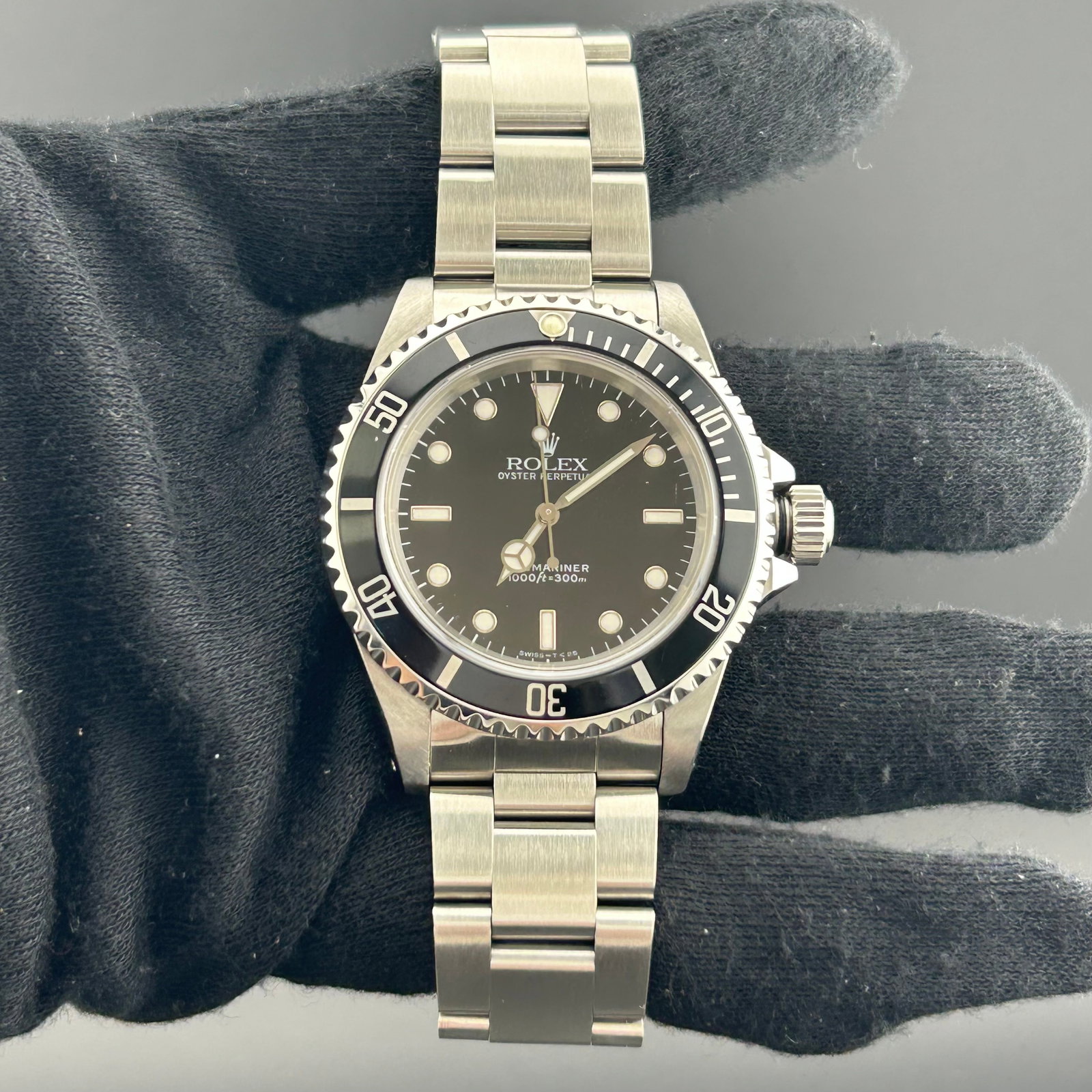 Rolex 14060 Submariner No Date Mens Watch Black Dial Oyster Bracelet Papers: Rolex 14060 Submariner No Date Mens Watch Black Dial Oyster Bracelet Papers Rolex Submariner No Date wristwatch, reference 14060, with black dial and rotating bezel. It is fitted with an Oyster bracel