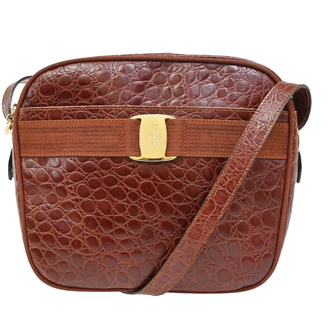 Salvatore Ferragamo Vala brown leather crossbody shoulder bag: Salvatore Ferragamo Vala brown leather crossbody shoulder bag This Salvatore Ferragamo Vala shoulder bag is crafted from brown leather and designed for women. It features a classic crossbody shoulder 