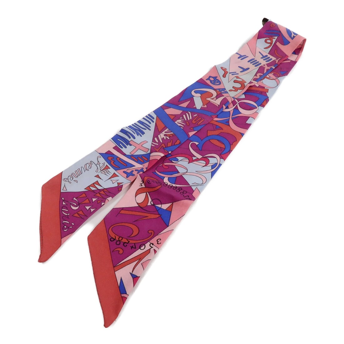 Hermes Twilly Silk Scarf in Pink 86cm x 5cm: Hermes Twilly Silk Scarf in Pink 86cm x 5cm Hermes Twilly scarf in pink silk, identified as model Twilly. The item measures 86 cm x 5 cm (33.9 in x 2.0 in) and is described as having reasonable wear a