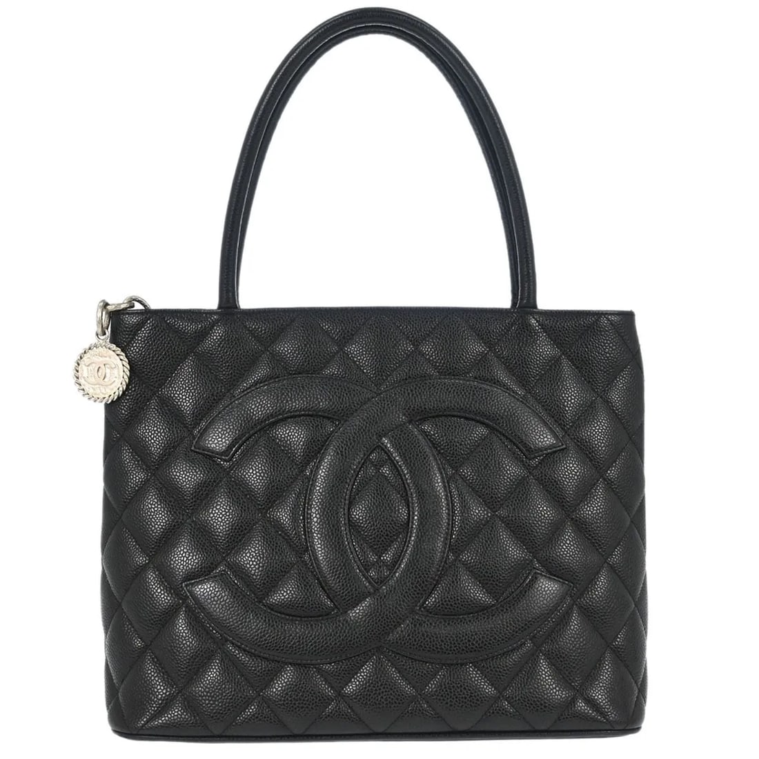 Chanel Medallion Tote Black Calfskin Quilted Handbag: Chanel Medallion Tote Black Calfskin Quilted Handbag A Chanel Medallion Tote in black, crafted in calfskin, with a quilted finish. This female tote is made in Italy and measures 30 cm x 25 cm x 15 cm.