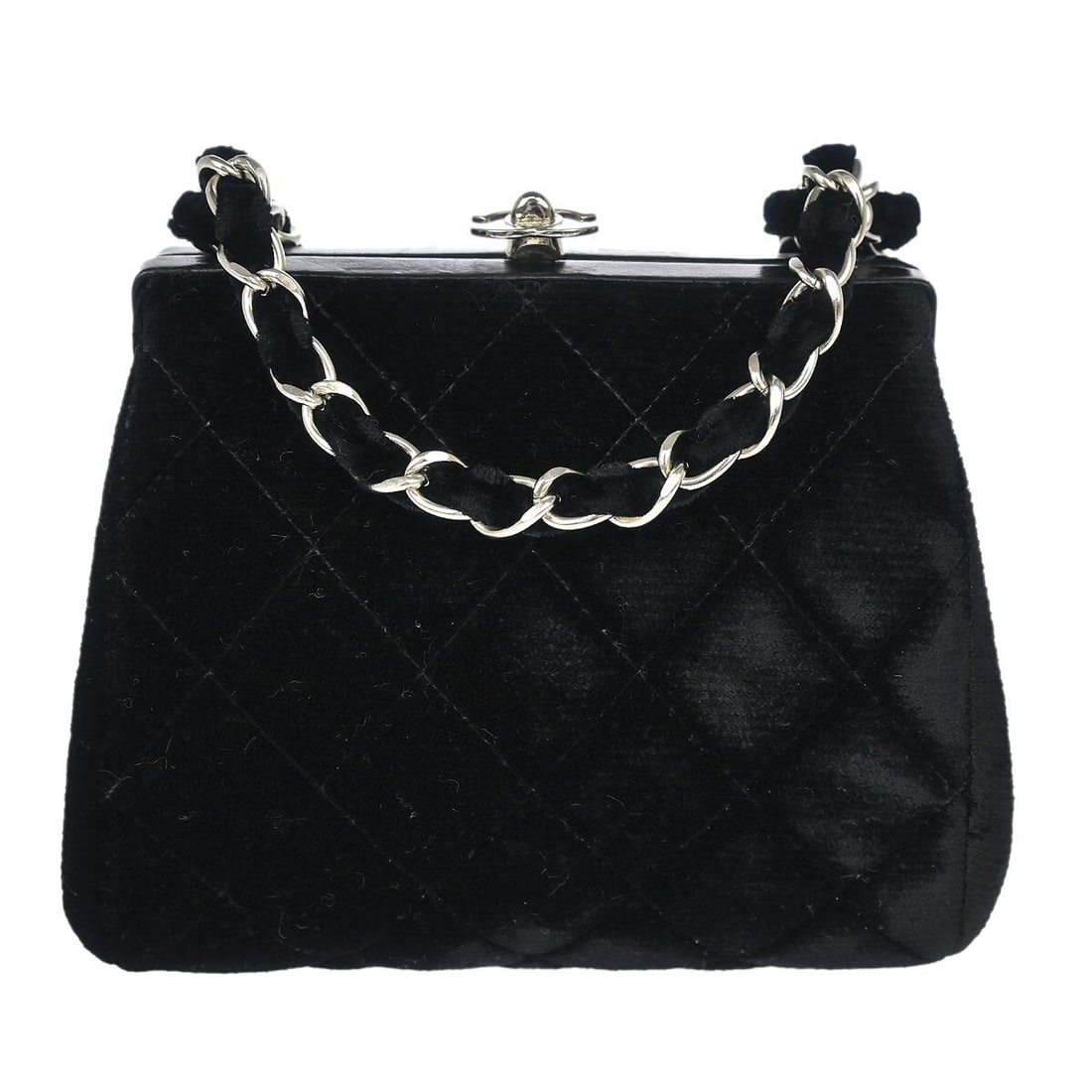CHANEL Quilted Small Black Velvet Shoulder Bag Kiss Lock: CHANEL Quilted Small Black Velvet Shoulder Bag Kiss Lock A Chanel small shoulder bag crafted in black velvet and made in France. It features a kiss lock closure, a shoulder strap with a 24 in drop, an