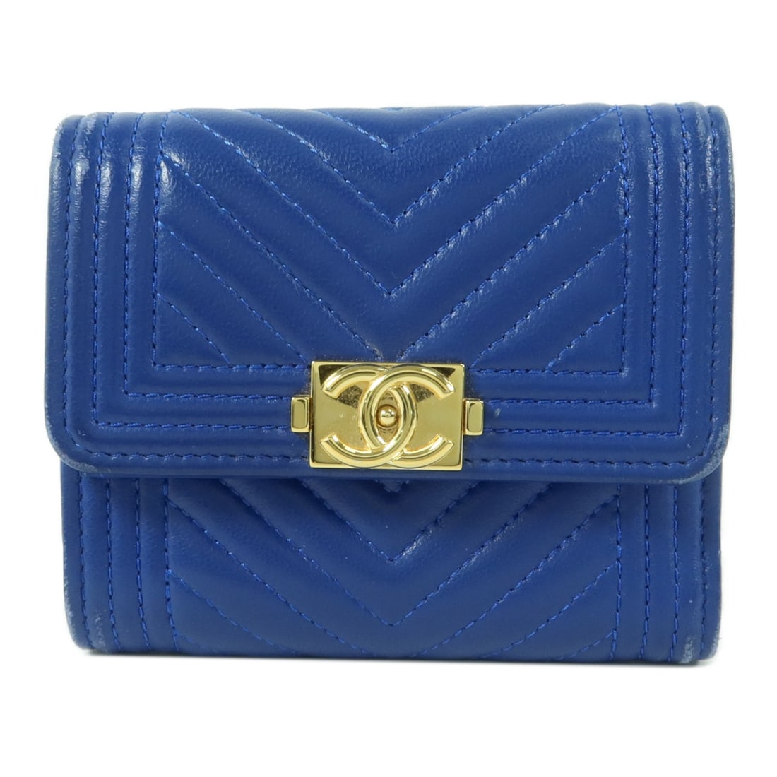 Chanel Boy Lambskin Wallet Blue CC with GHW: Chanel Boy Lambskin Wallet Blue CC with GHW CHANEL Boy Wallet in blue lambskin leather with gold-tone hardware. It features a hook button closure, two open compartments, and six card slots. The wallet